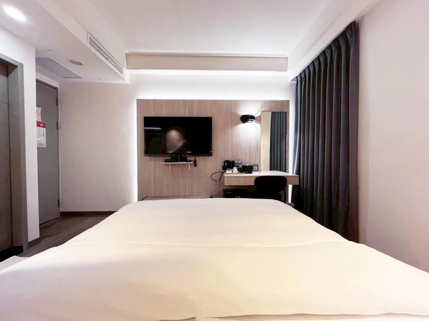 Bed in Dolamanco Hotel