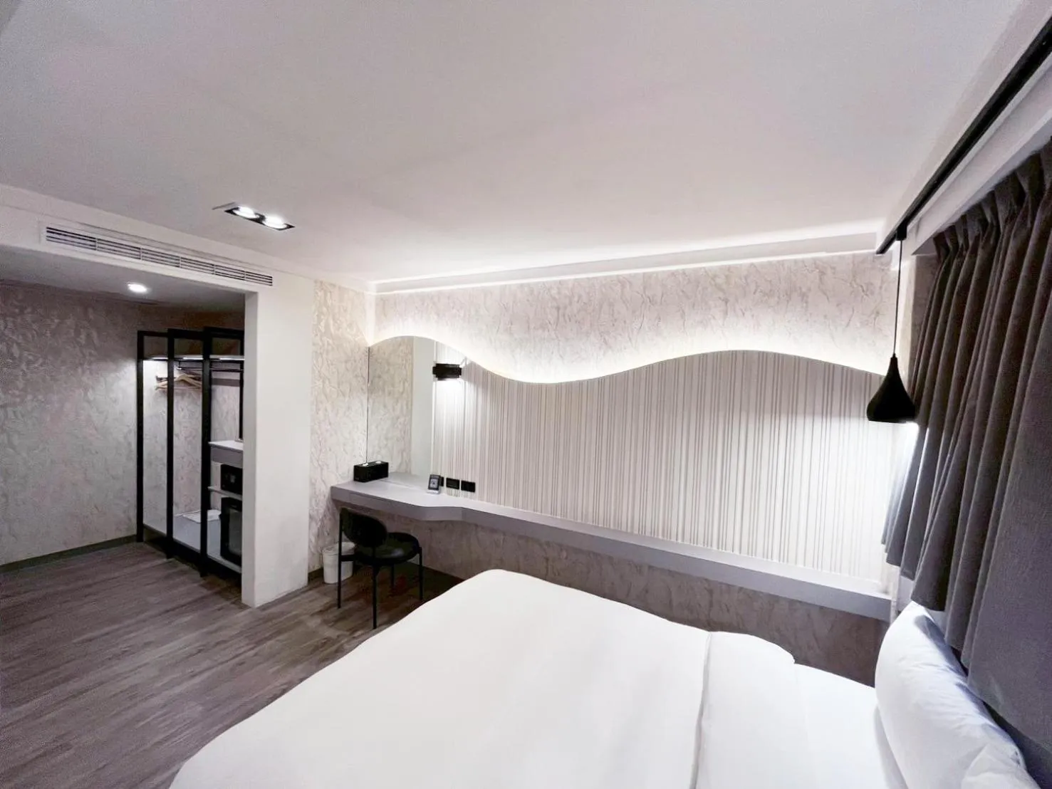 Bed in Dolamanco Hotel