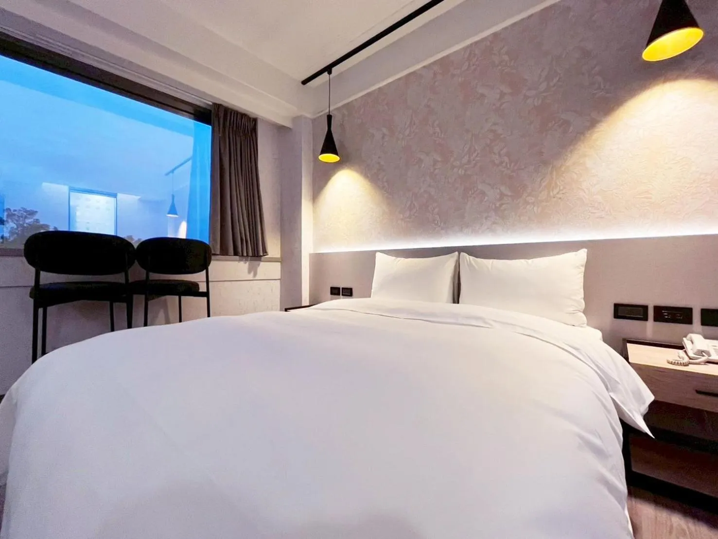 Bed in Dolamanco Hotel