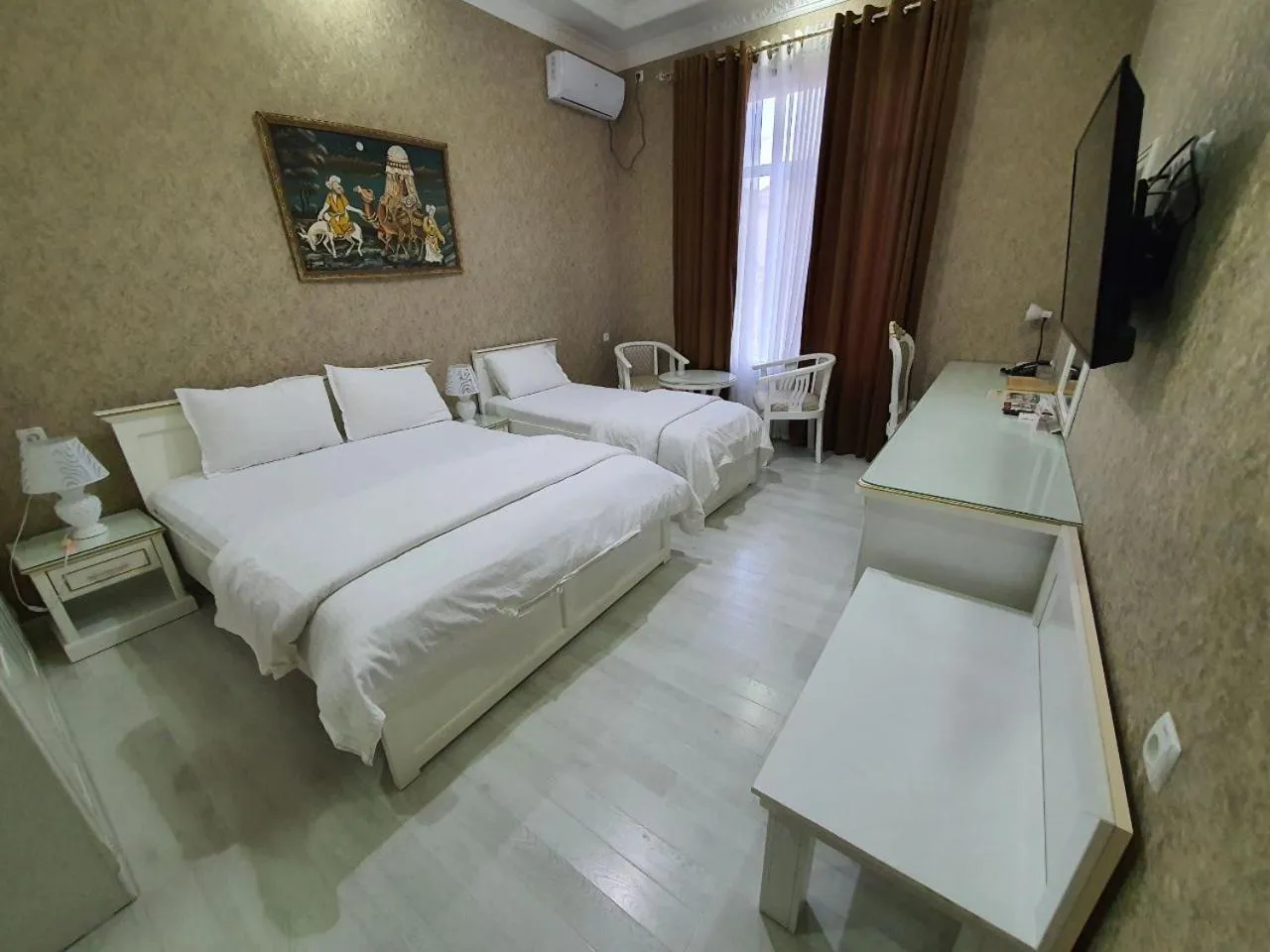 Bed in Ideal Hotel