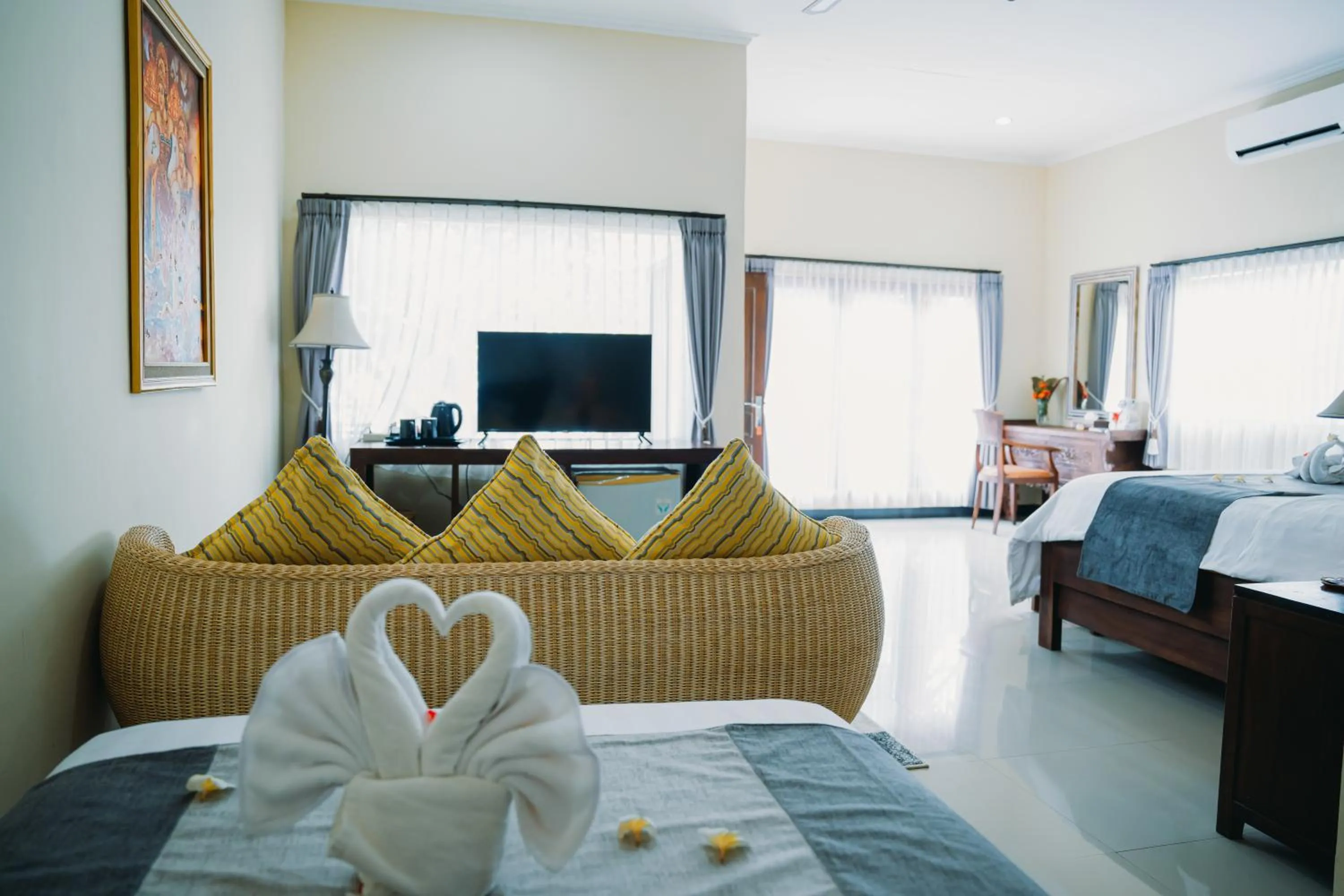 Bed in Puri Wirata Dive Resort and Spa Amed