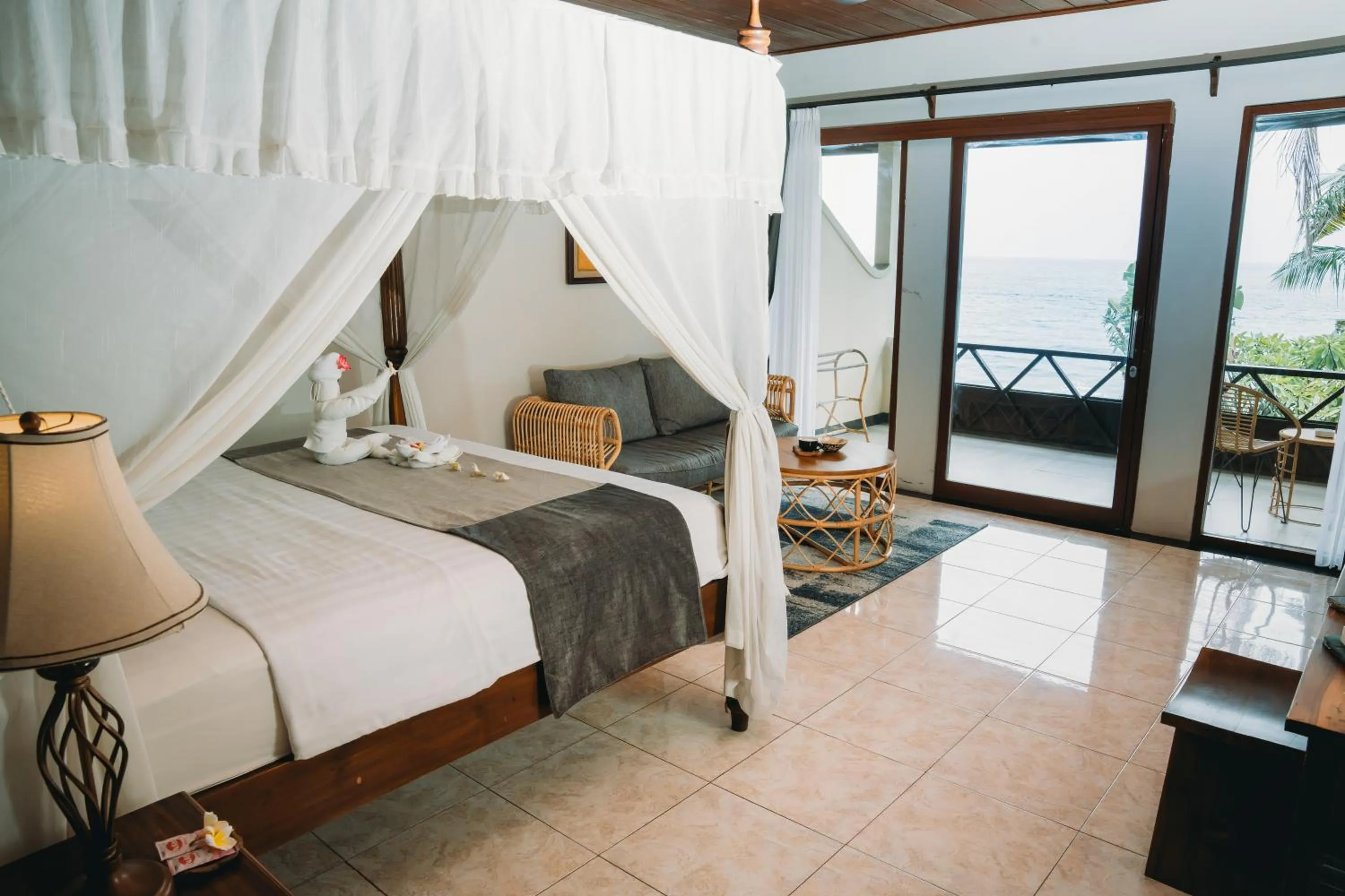 Bed in Puri Wirata Dive Resort and Spa Amed
