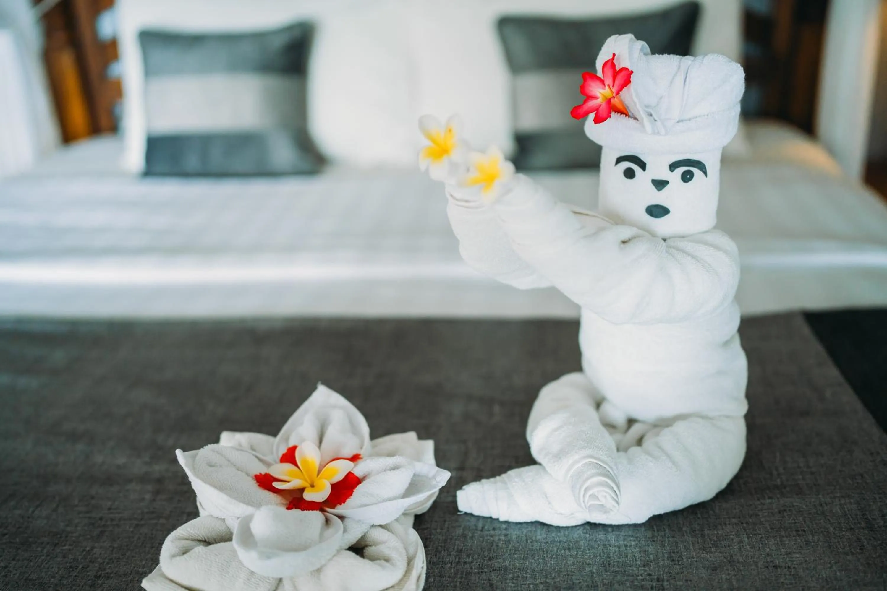 Bed in Puri Wirata Dive Resort and Spa Amed