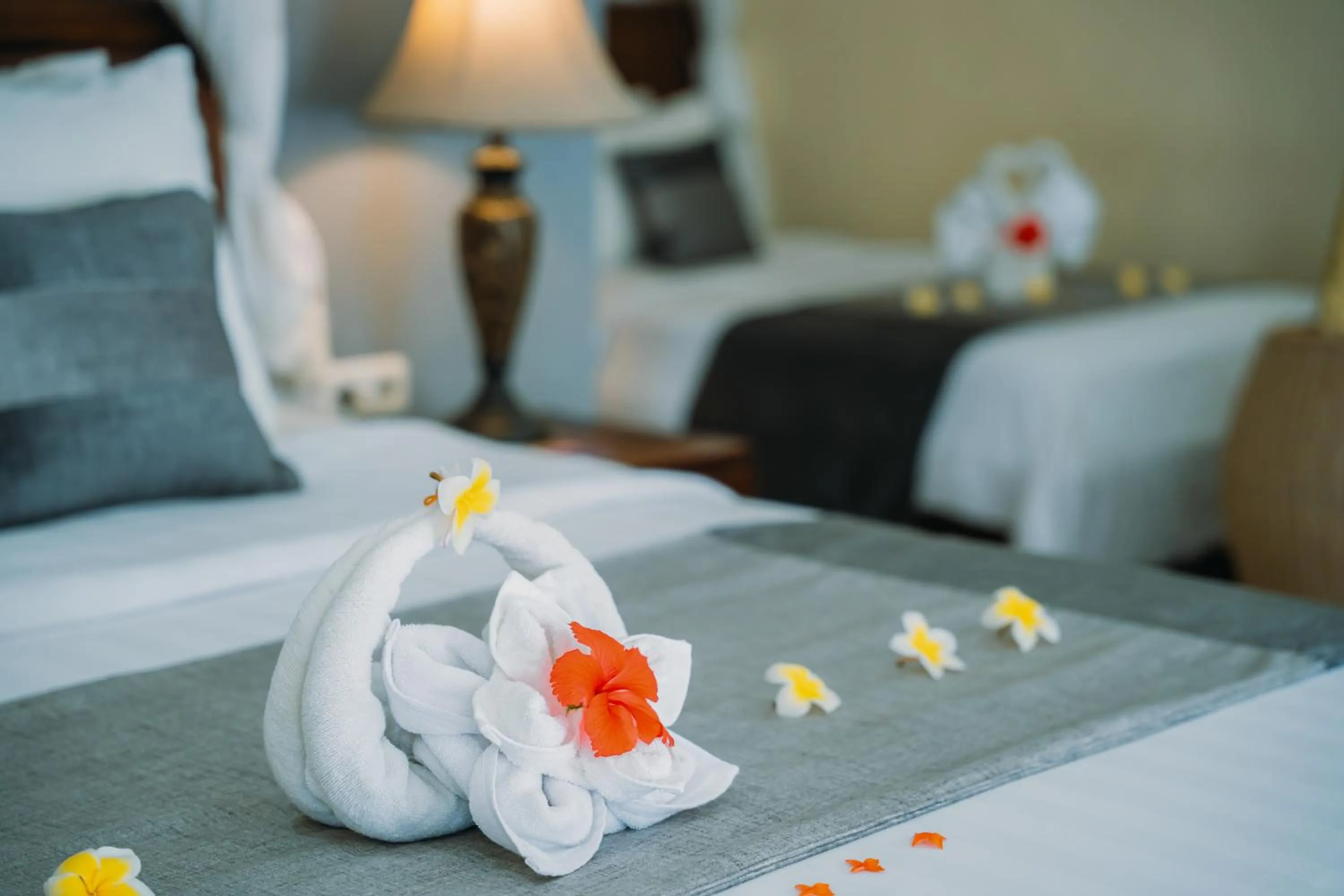 Bed in Puri Wirata Dive Resort and Spa Amed