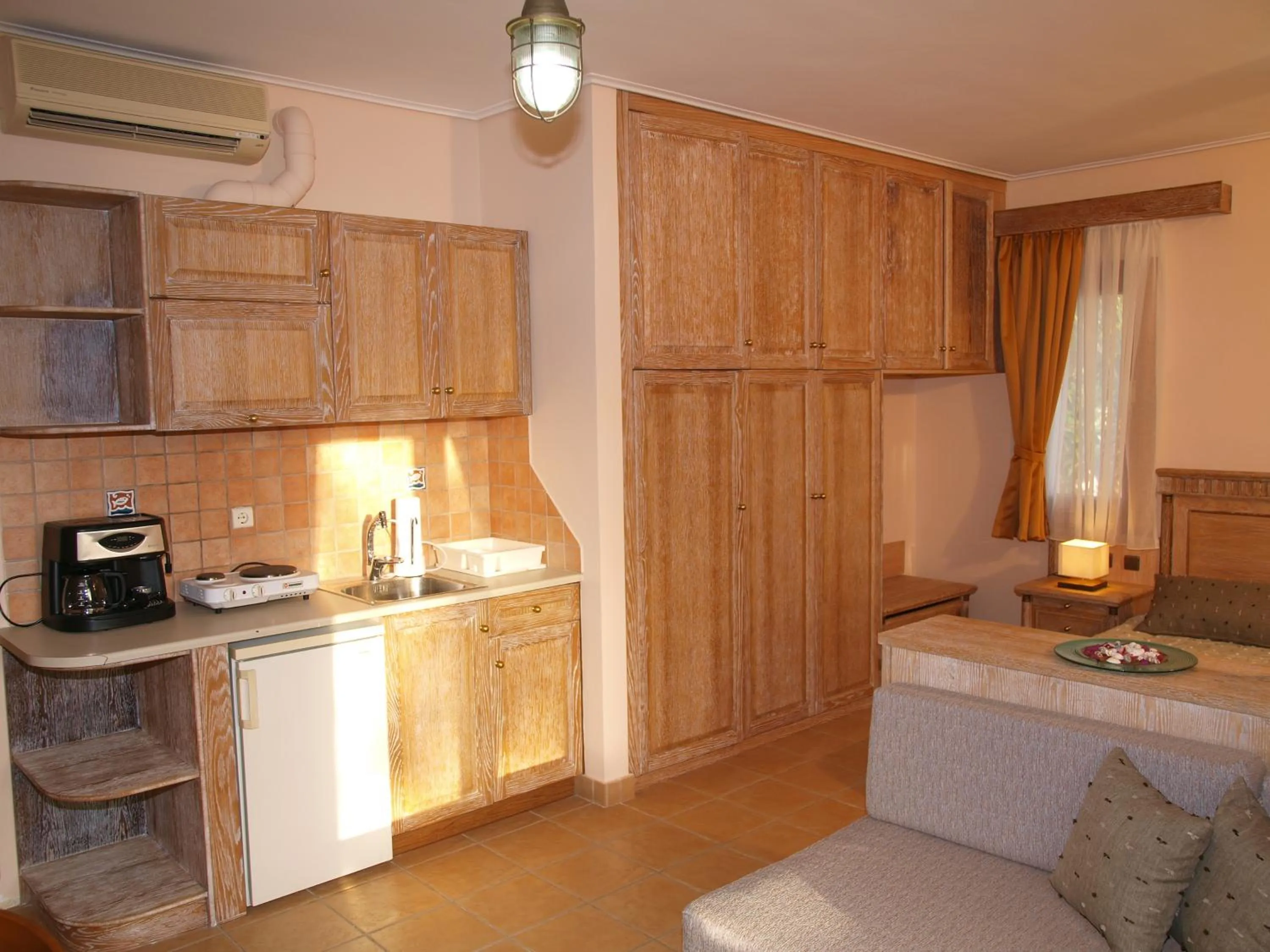 Kitchen or kitchenette in Mylos Hotel Apartments