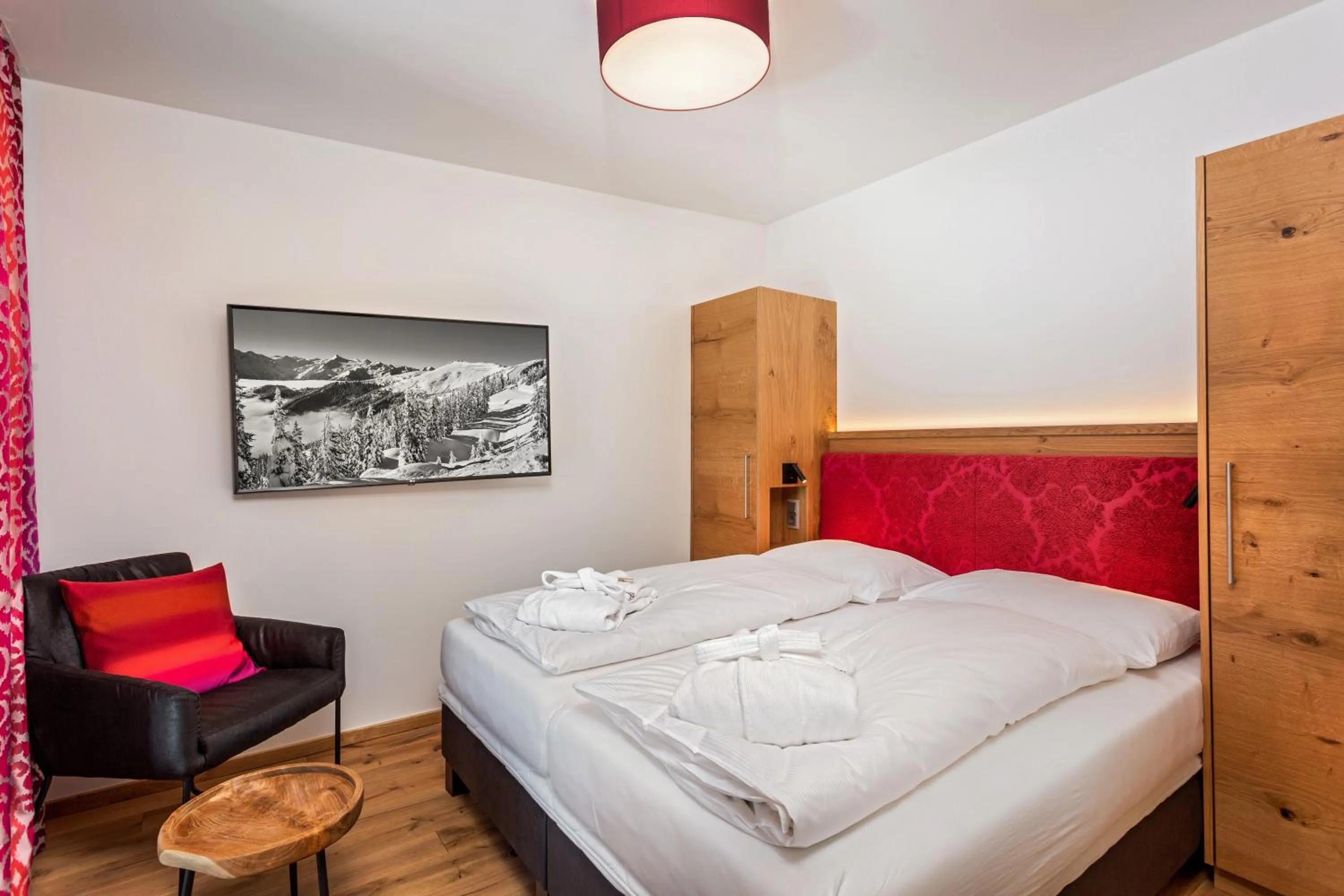 Bed in Berghotel Schmittenhöhe - 2000m