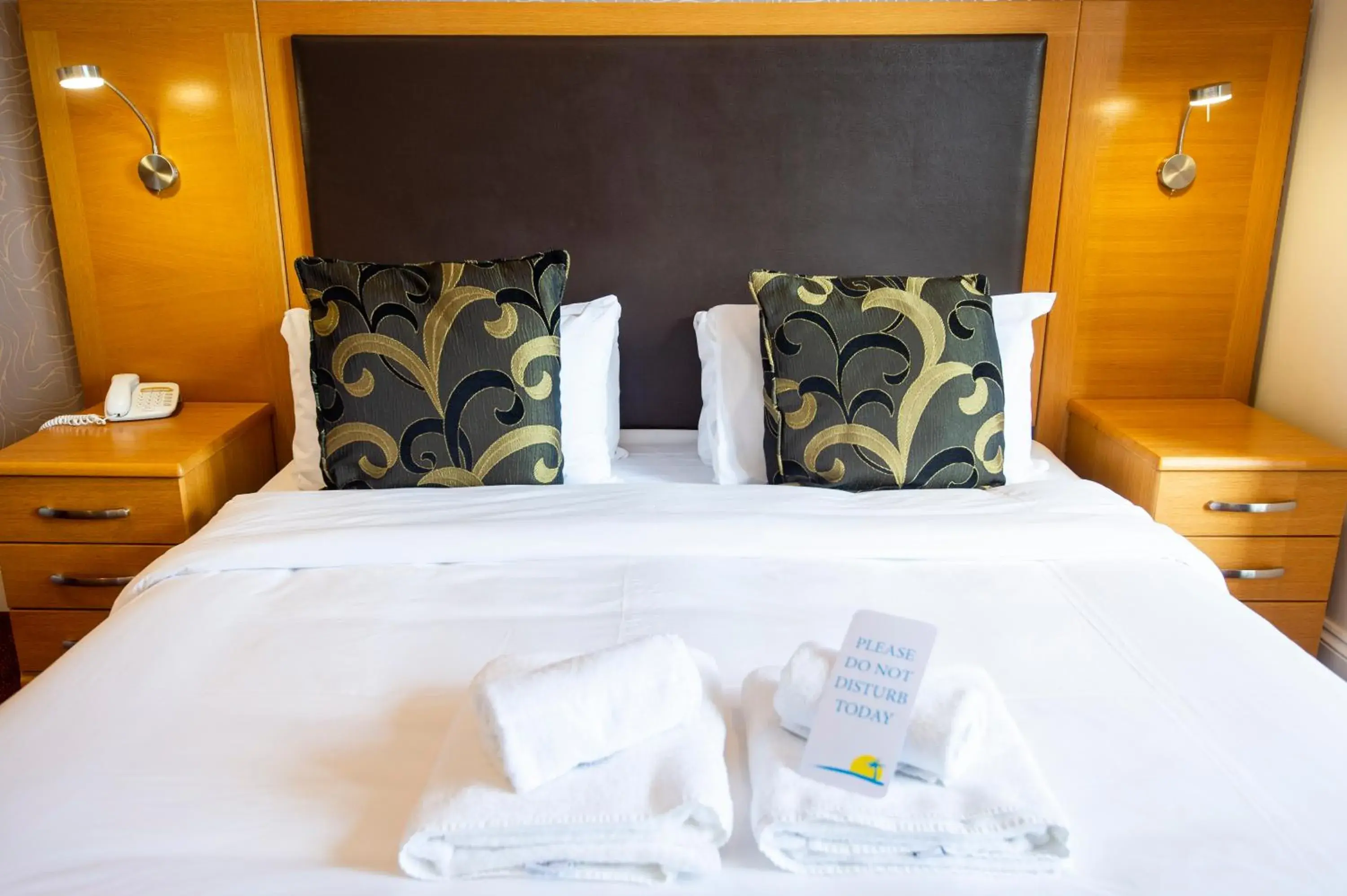 Bed in Palm Court Hotel Bed in Palm Court Hotel