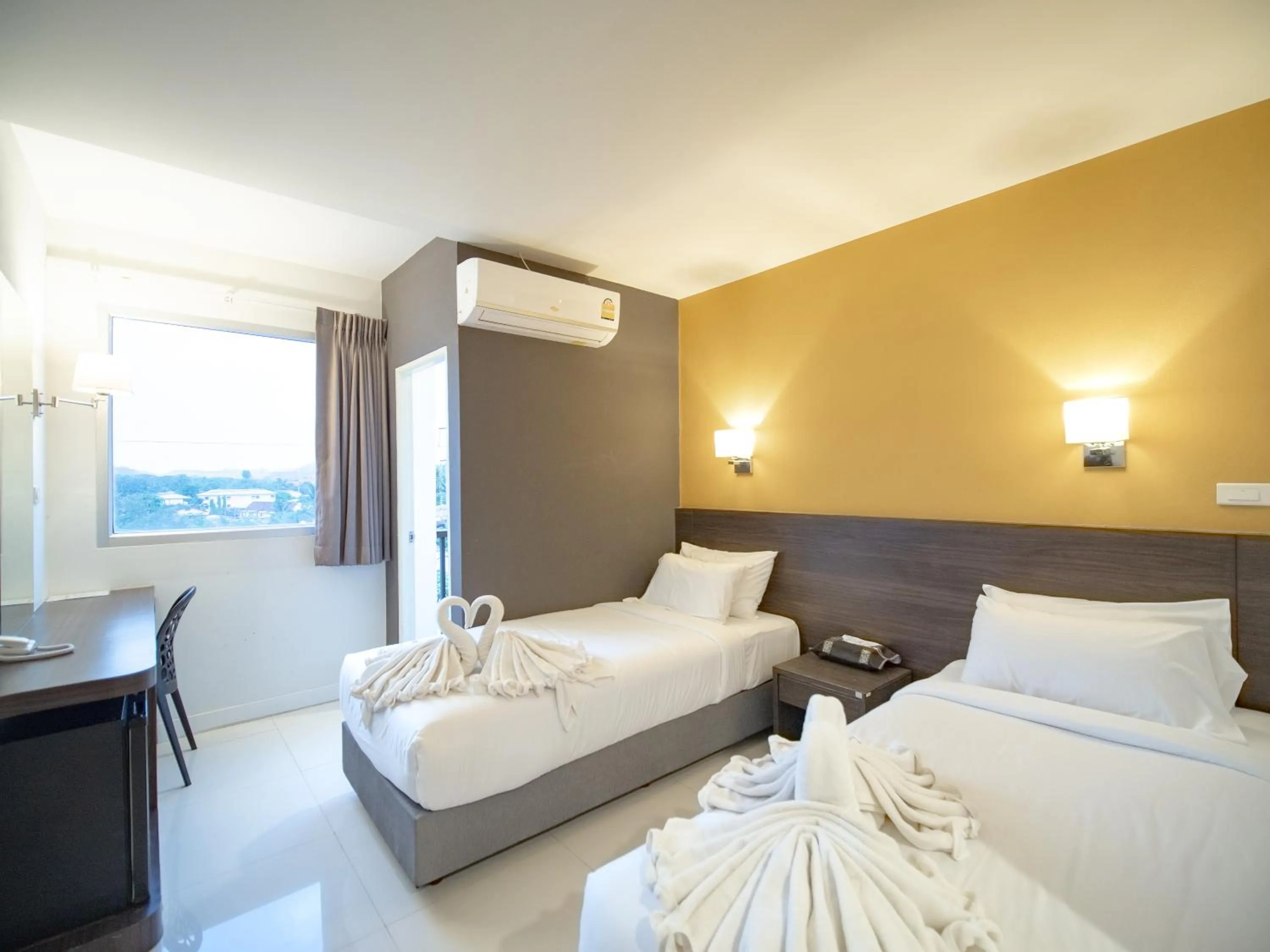 Bed in Fortune D Hotel Loei