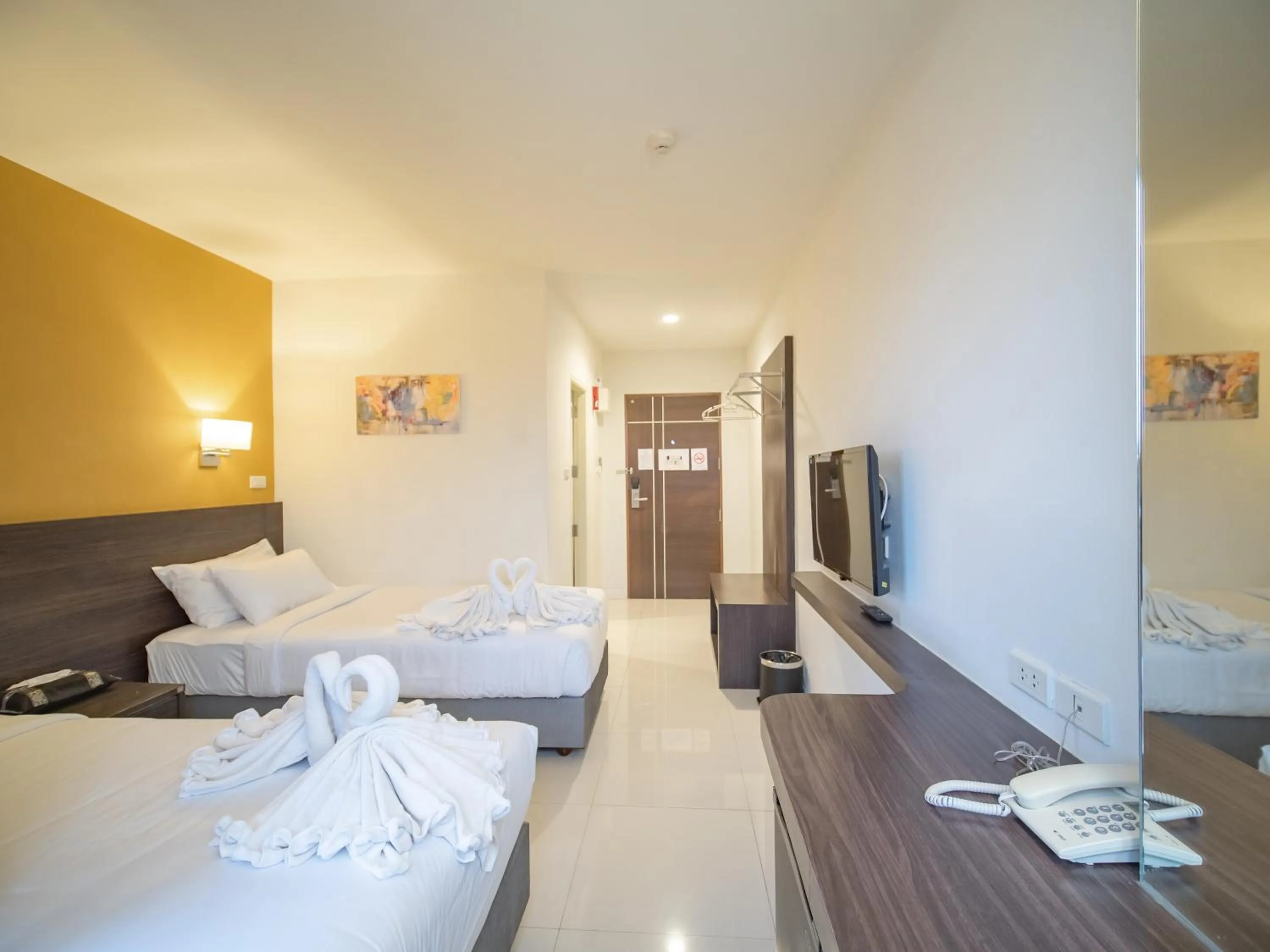 Bed in Fortune D Hotel Loei