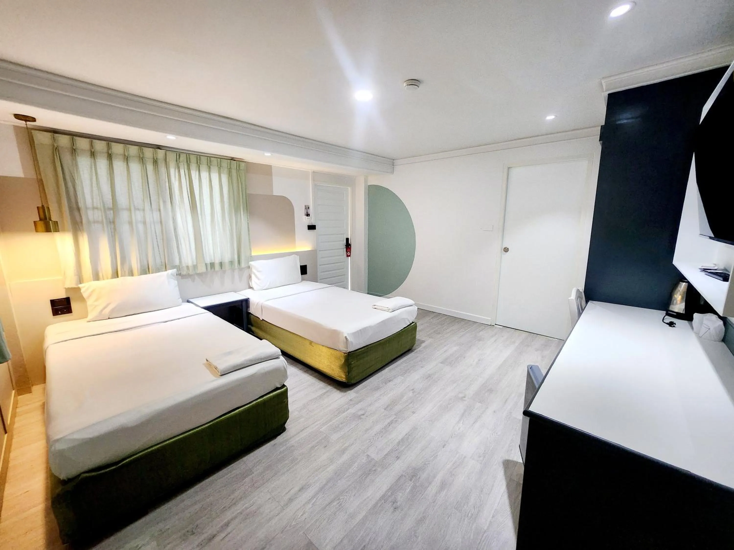 Photo of the whole room, Bed in SEATEL Phuket, Patong Beach