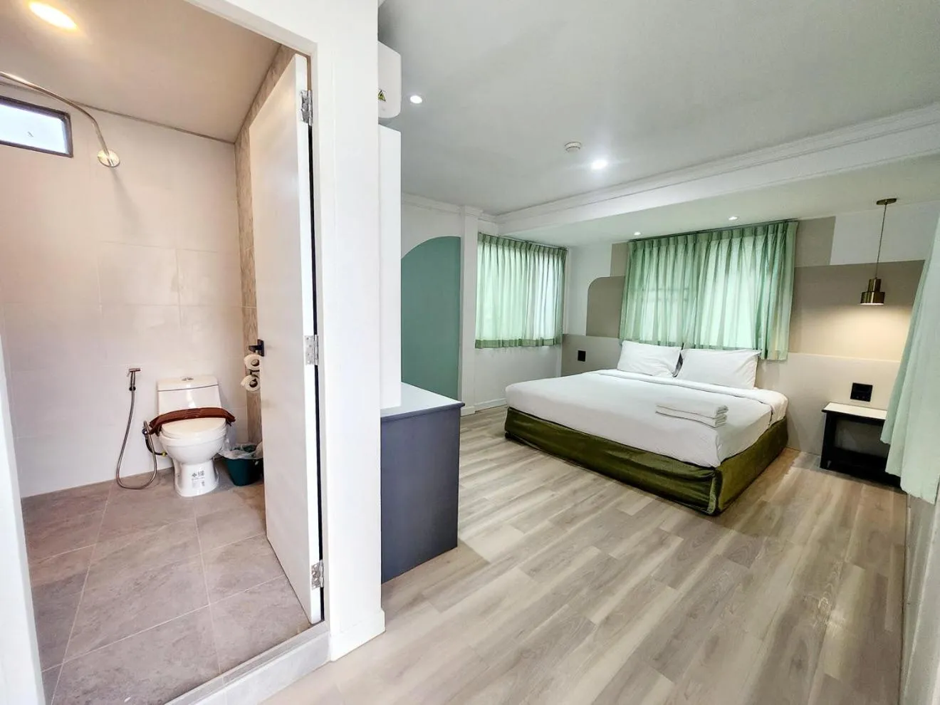 Photo of the whole room, Bed in SEATEL Phuket, Patong Beach