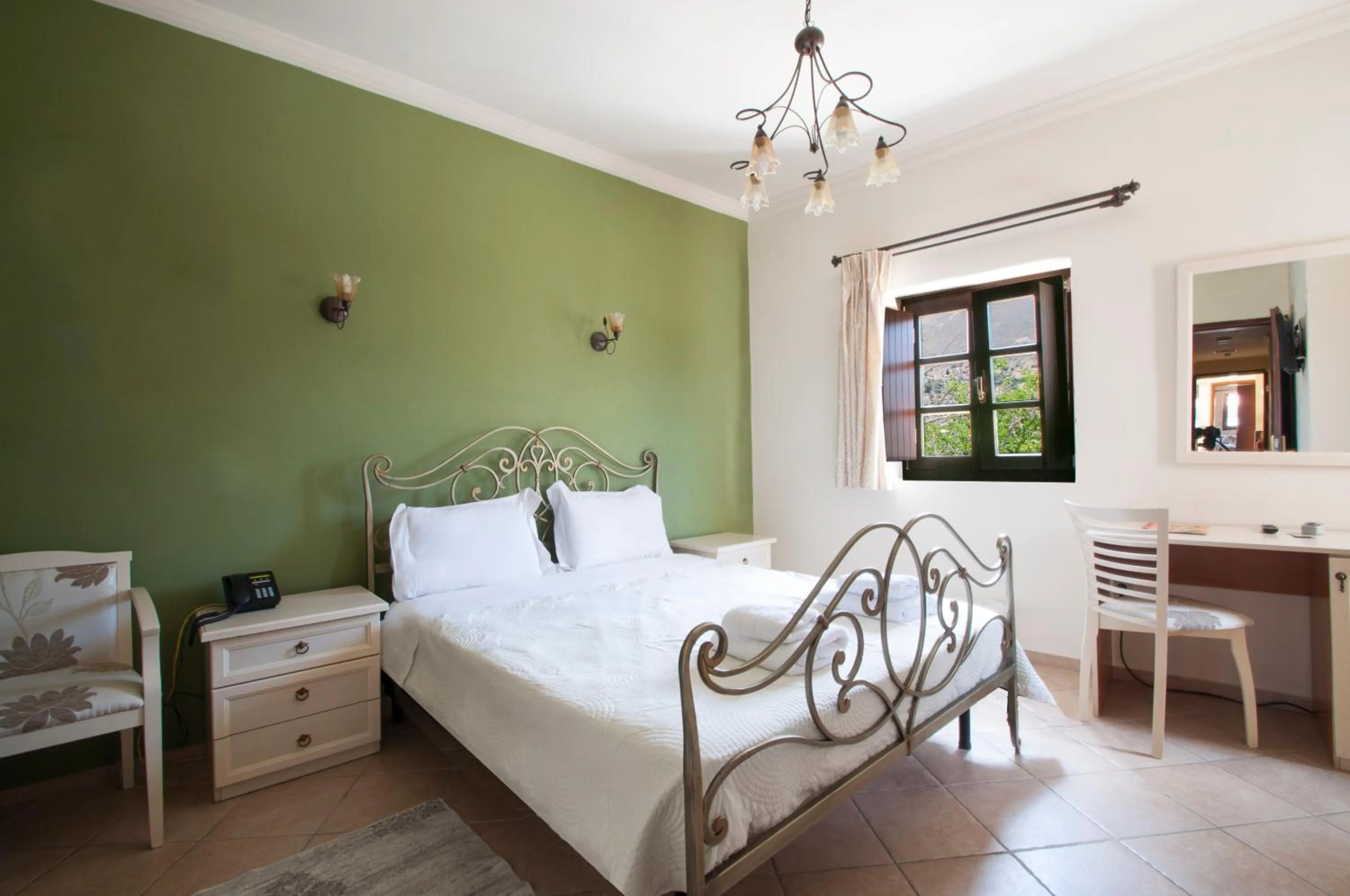 Bed in Areos Polis Boutique Hotel