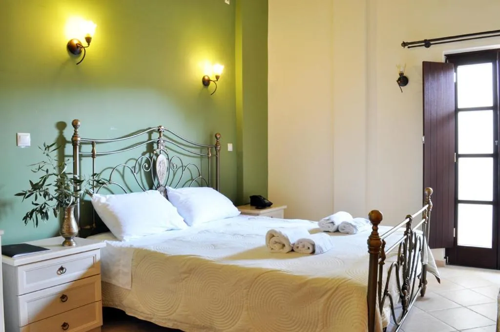 Bed in Areos Polis Boutique Hotel