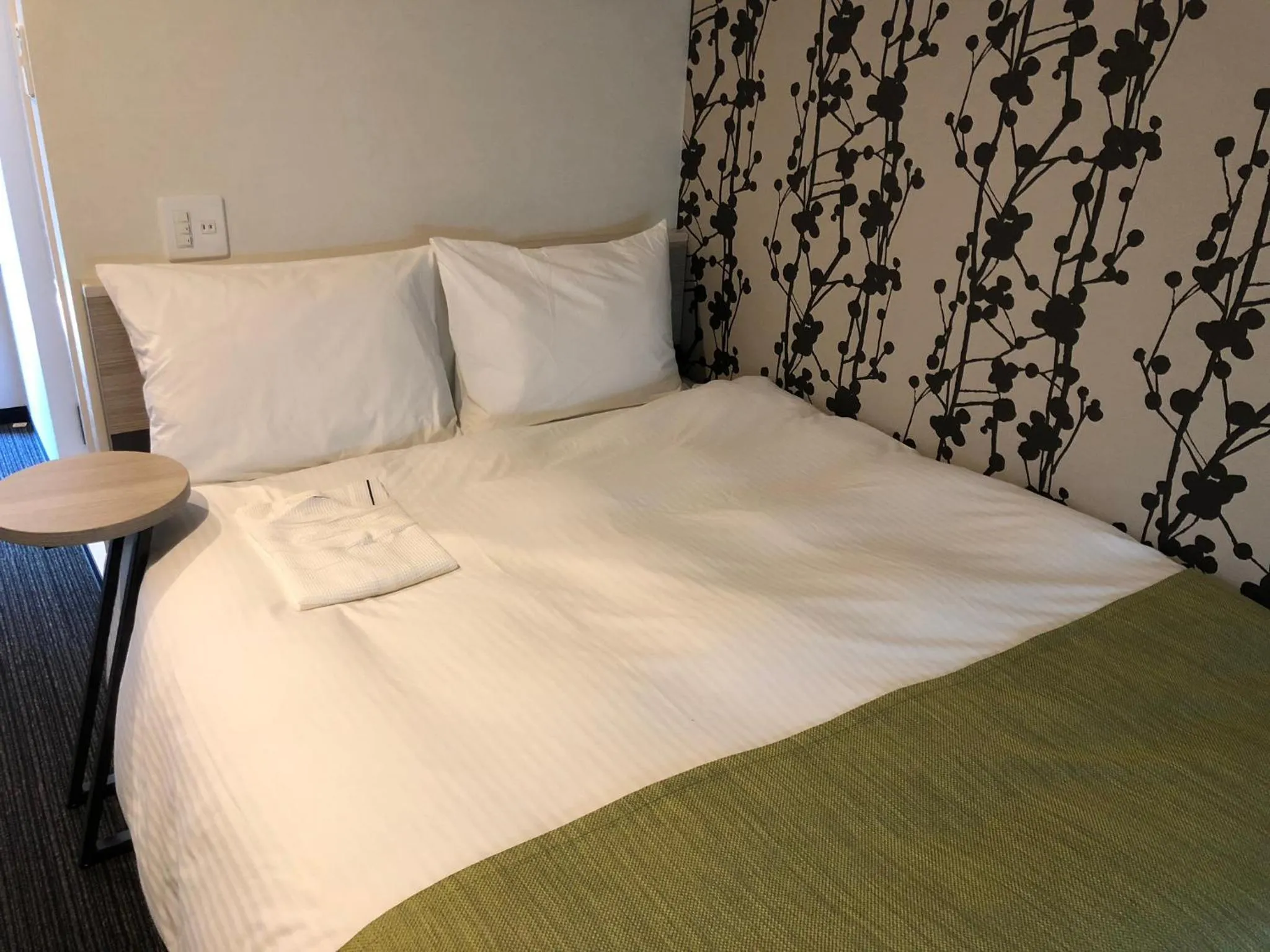 Bed in Kuretake Inn Osaka Sakaisuji Honmachi