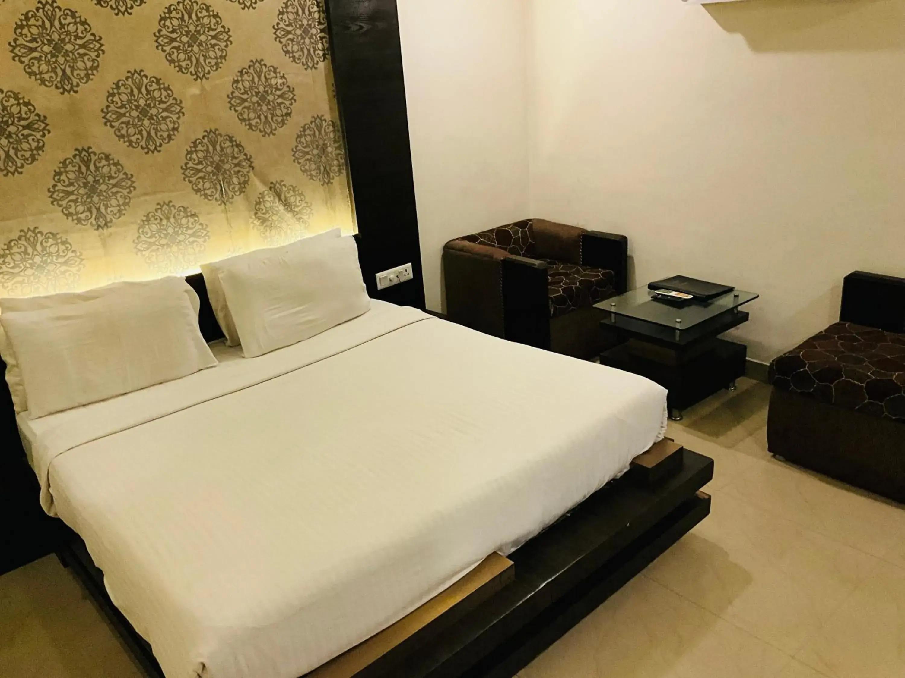 Seating area, Bed in Hotel Galaxy Seating area, Bed in Hotel Galaxy