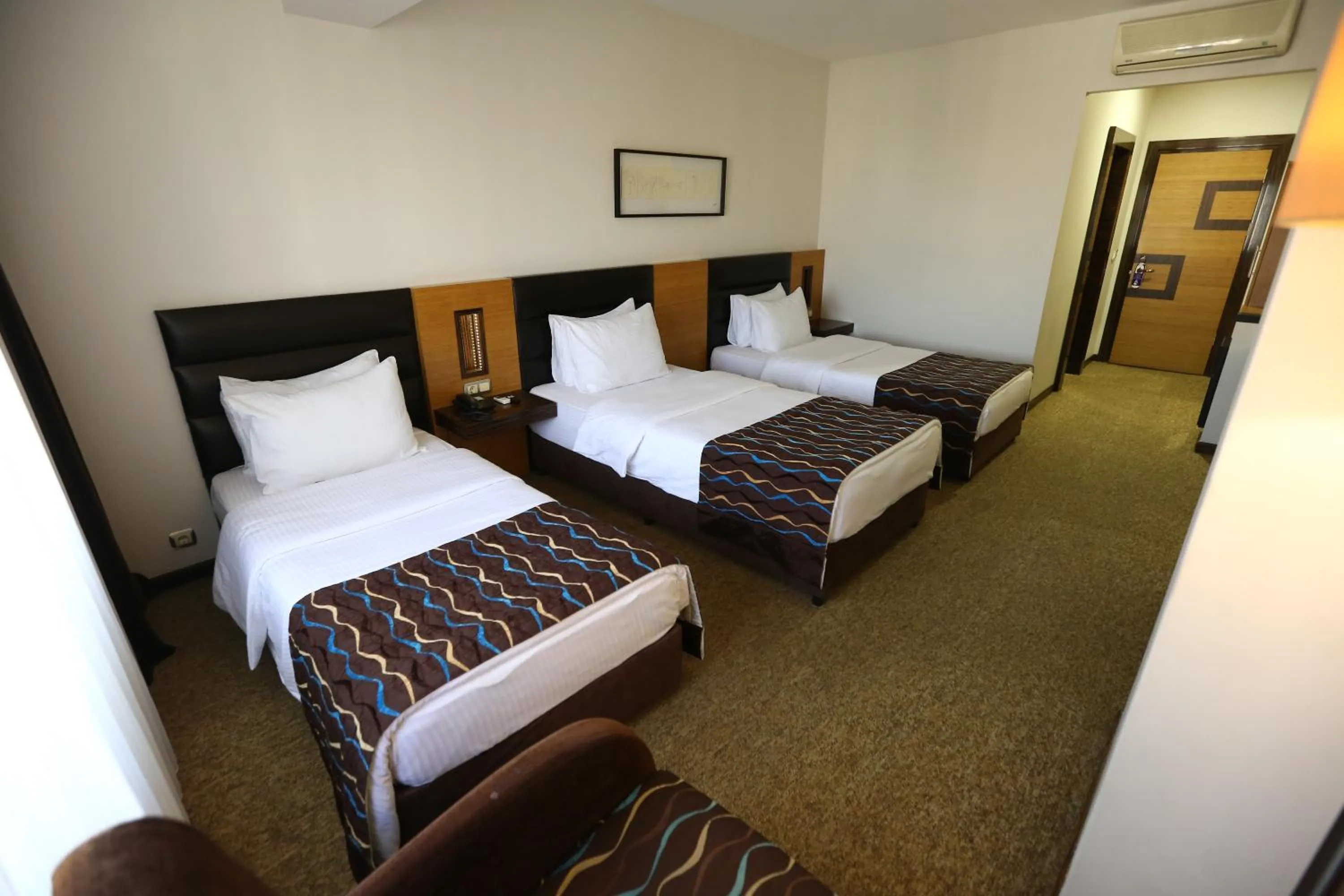 Bed in North Point Hotel