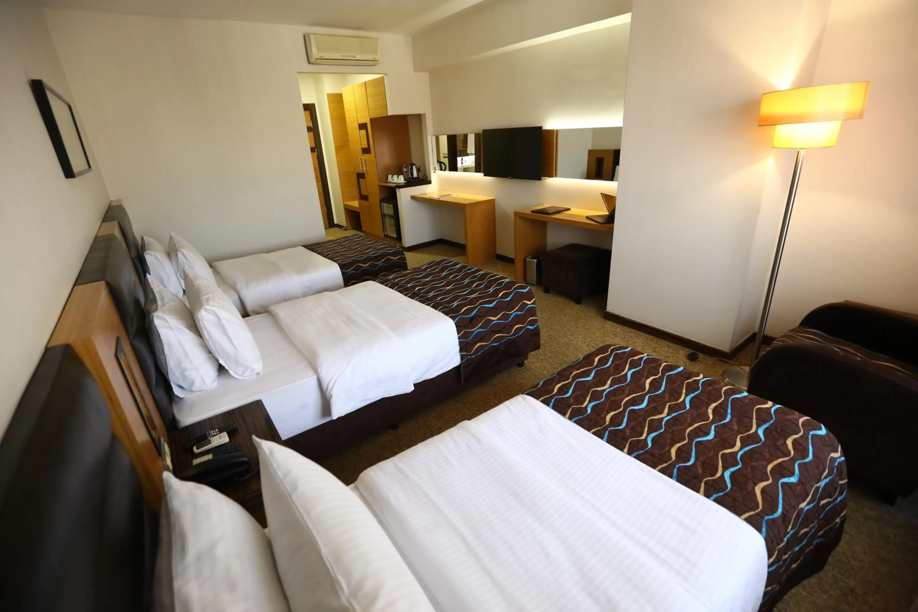 Bed in North Point Hotel