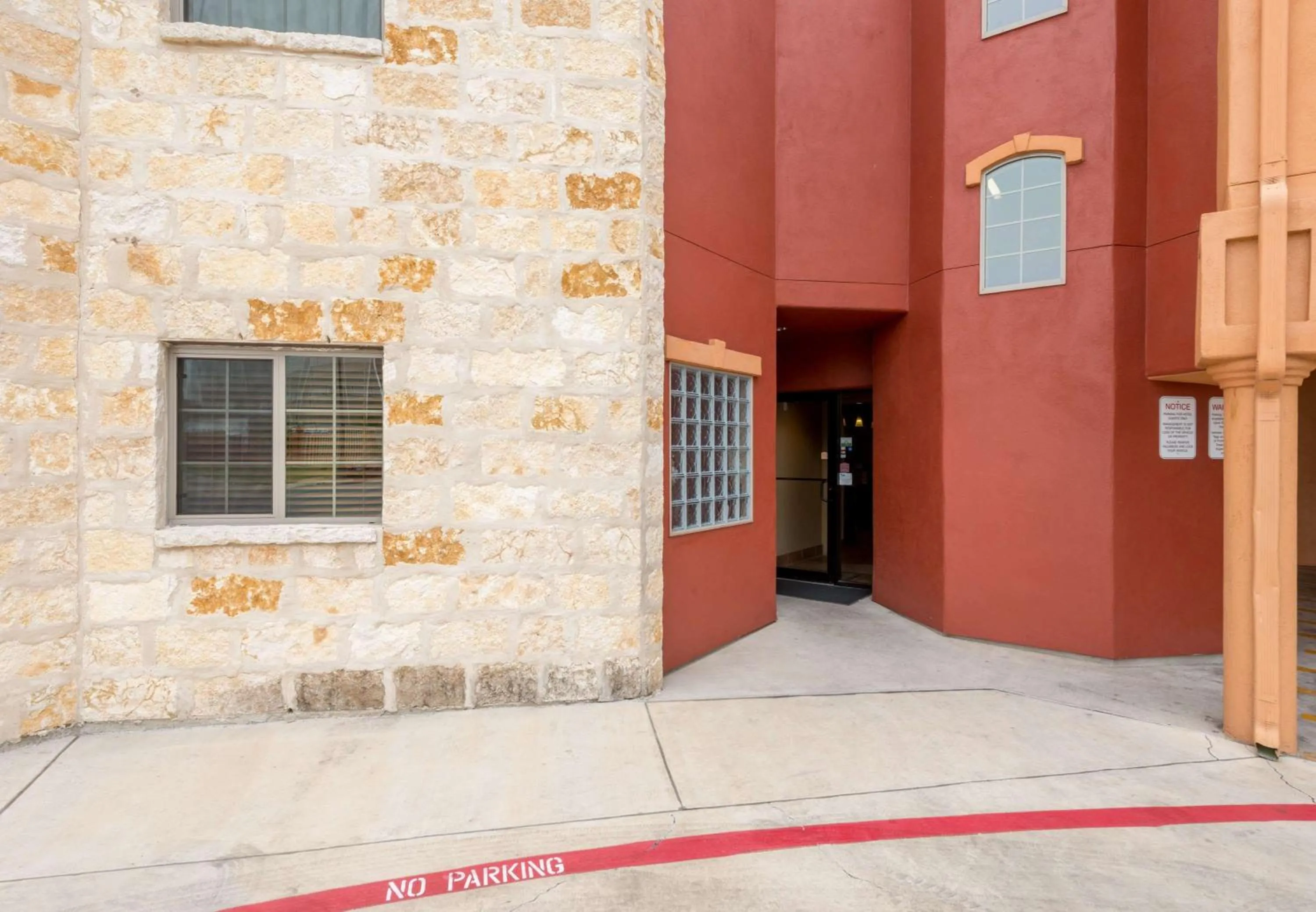 Property building in La Hacienda Inn near Alamodome & Riverwalk