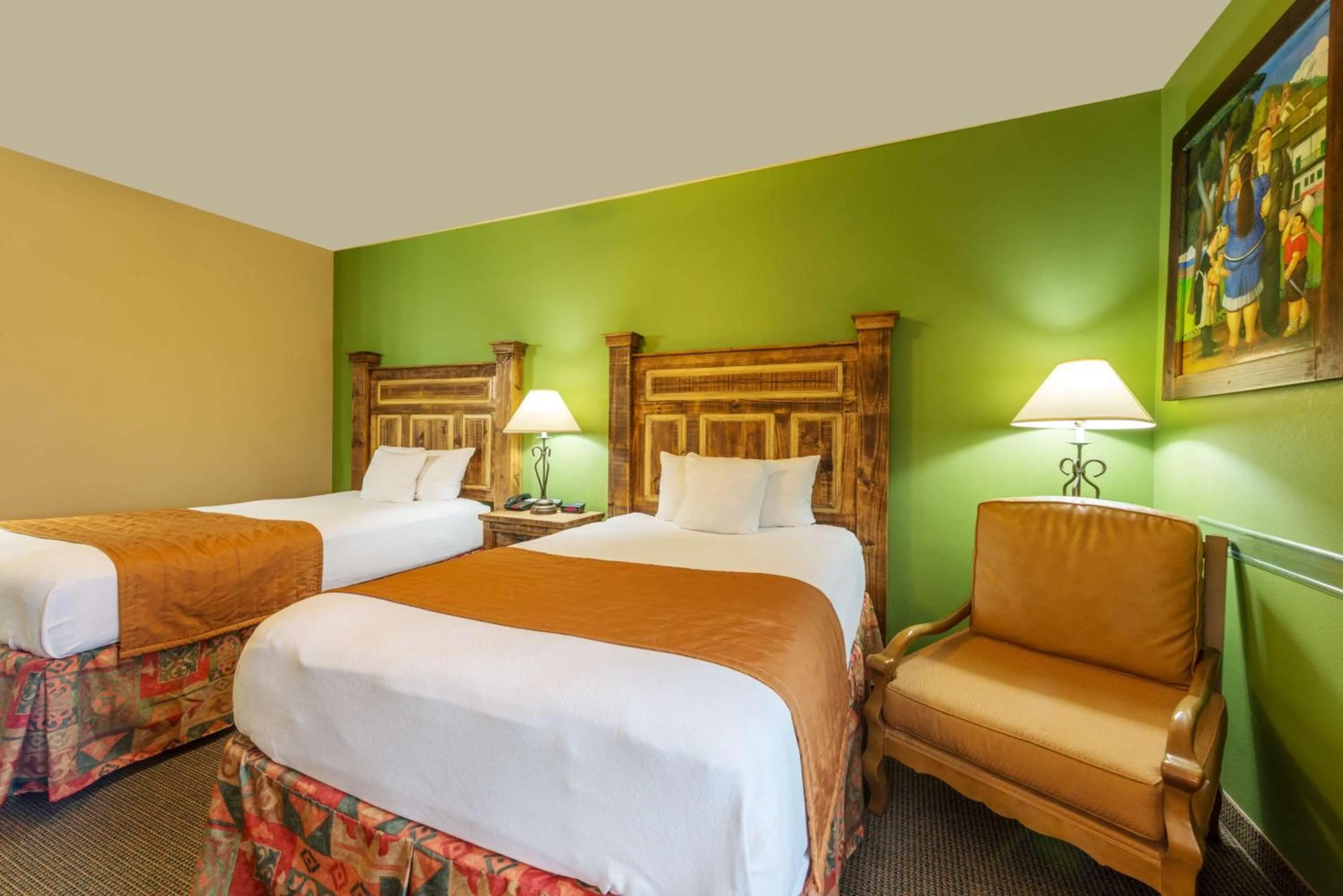 Photo of the whole room, Bed in La Hacienda Inn near Alamodome & Riverwalk