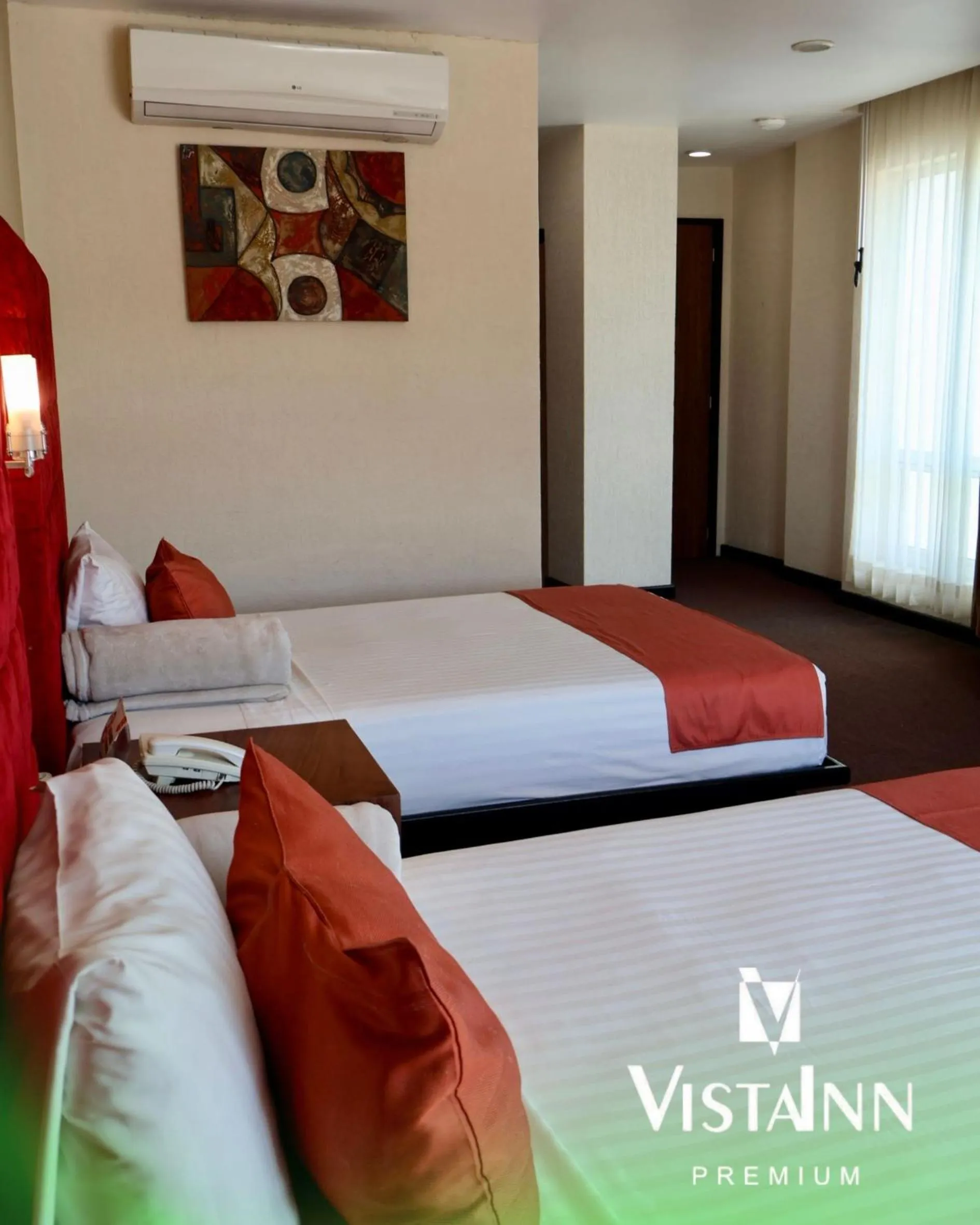 Bed in Hotel Vista Inn Premium