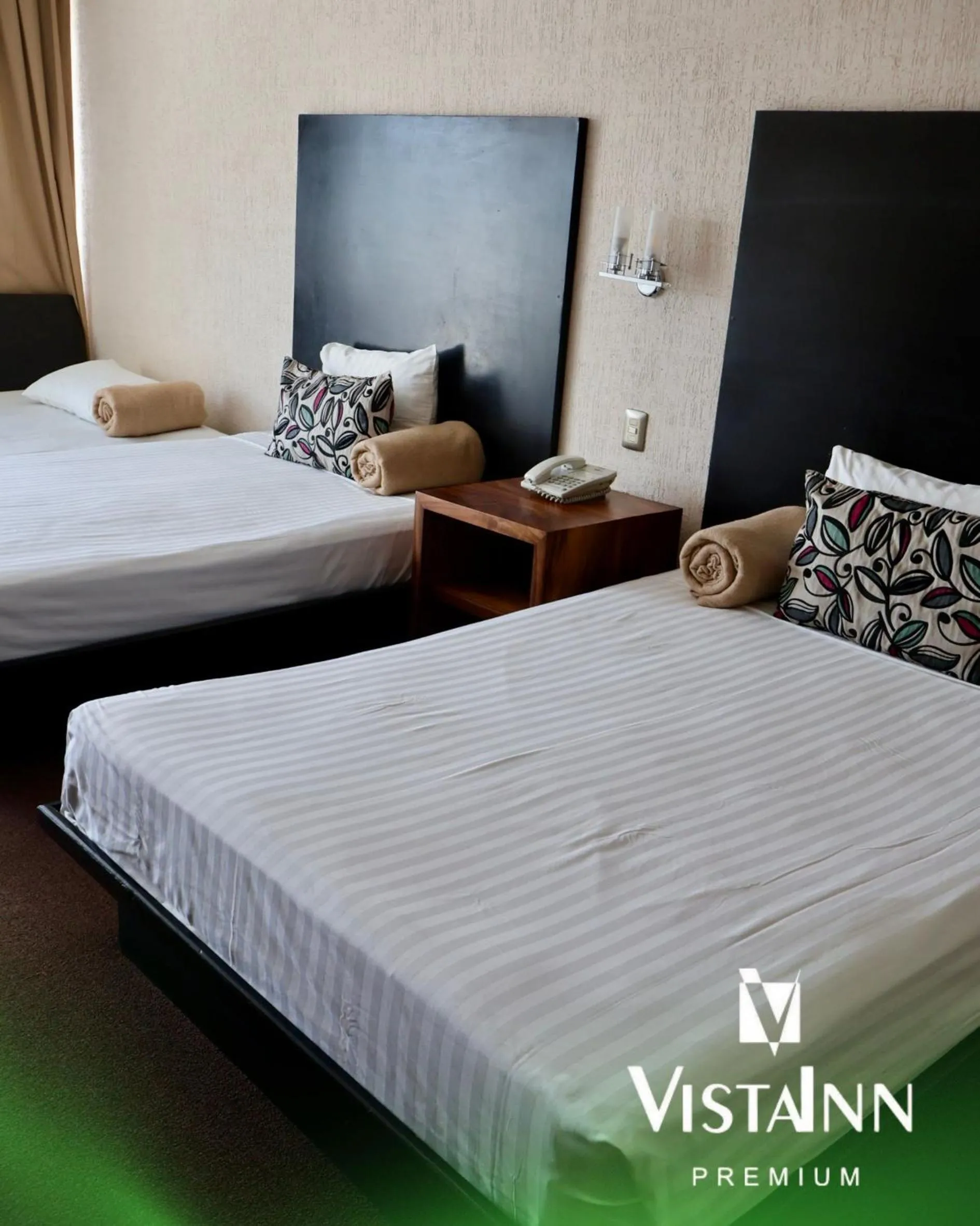 Bed in Hotel Vista Inn Premium