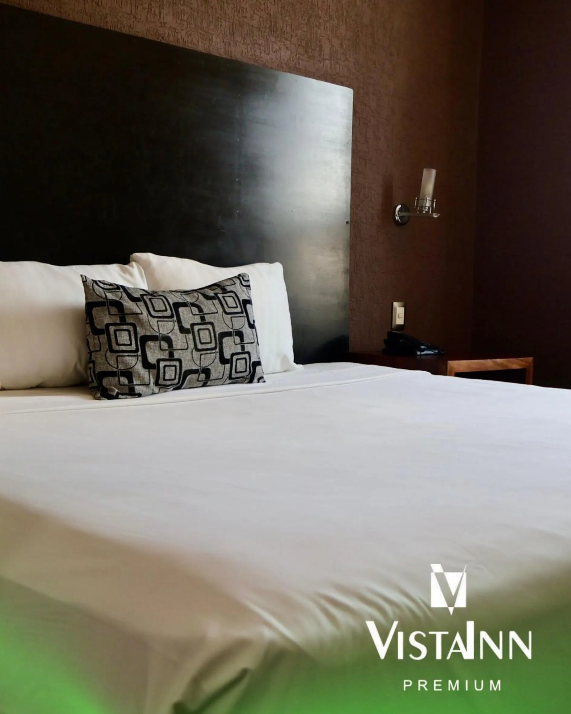 Bed in Hotel Vista Inn Premium