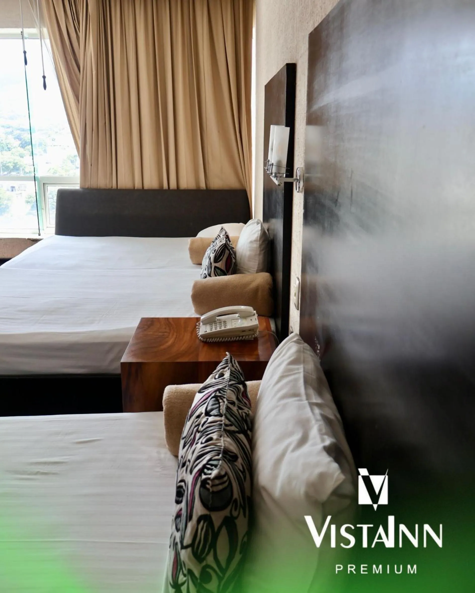 Bed in Hotel Vista Inn Premium