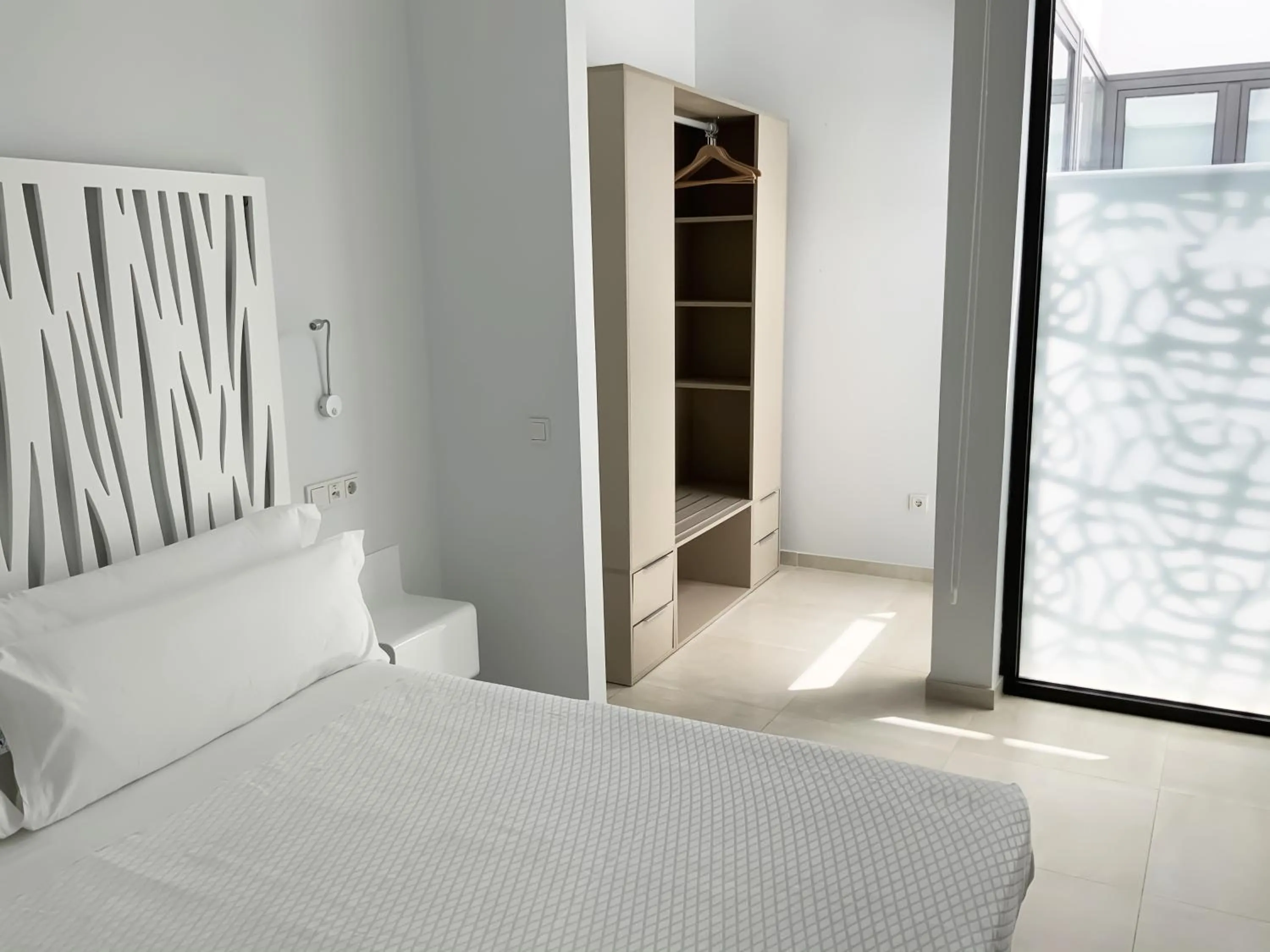 Bed in Feelathome Rivero Apartments