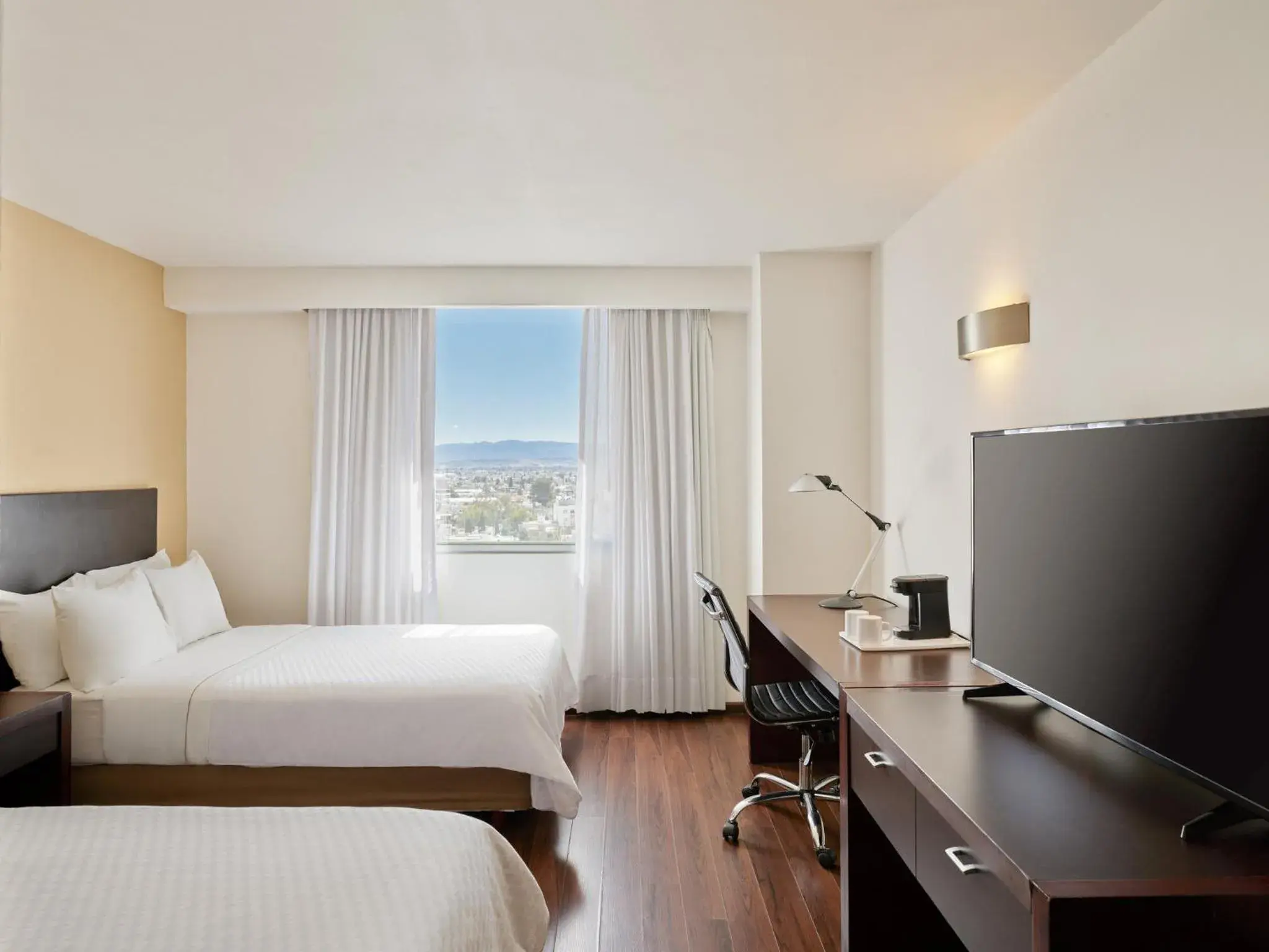 Photo of the whole room, Bed in Fiesta Inn Express Durango Photo of the whole room, Bed in Fiesta Inn Express Durango