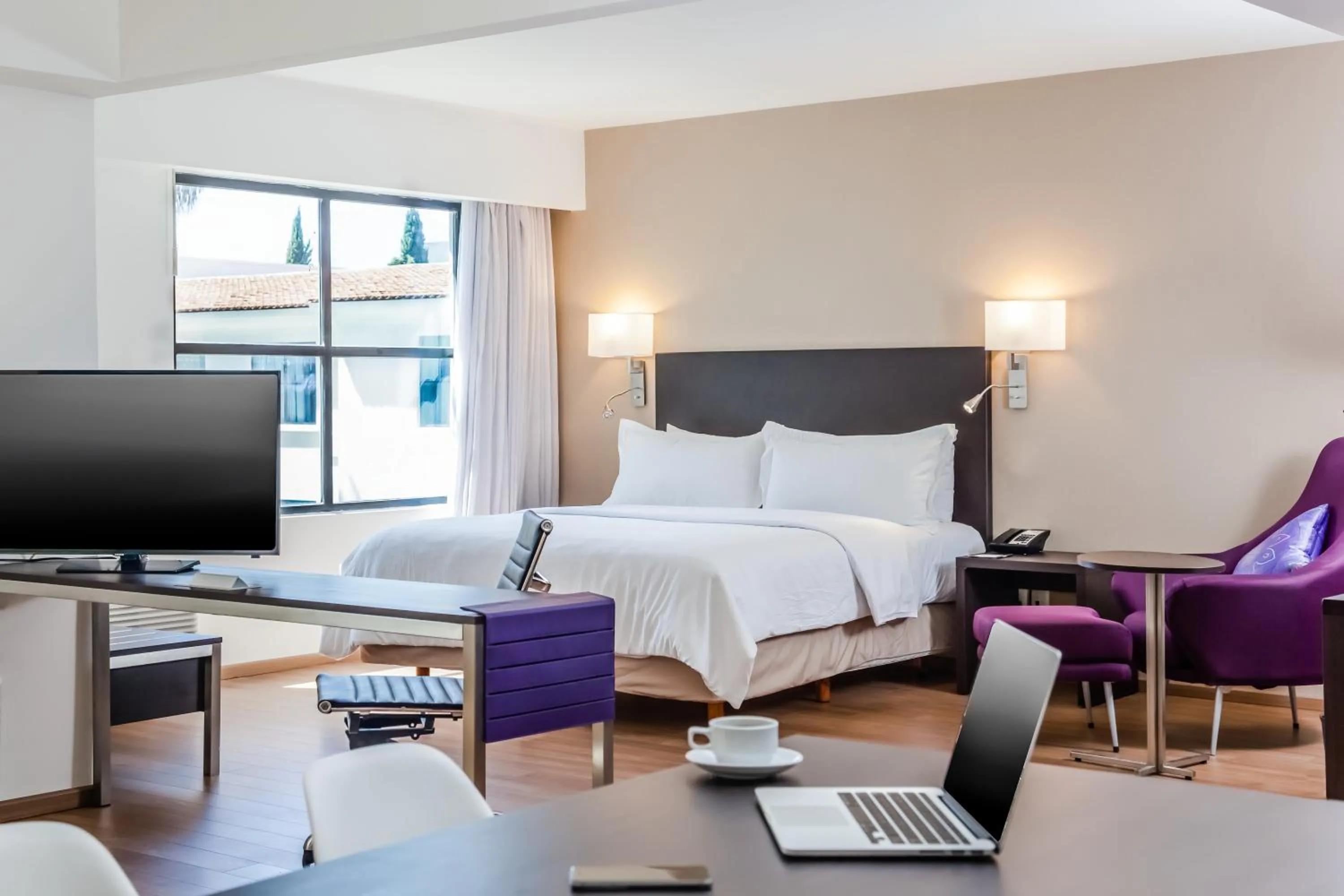 Photo of the whole room, Bed in Fiesta Inn Saltillo