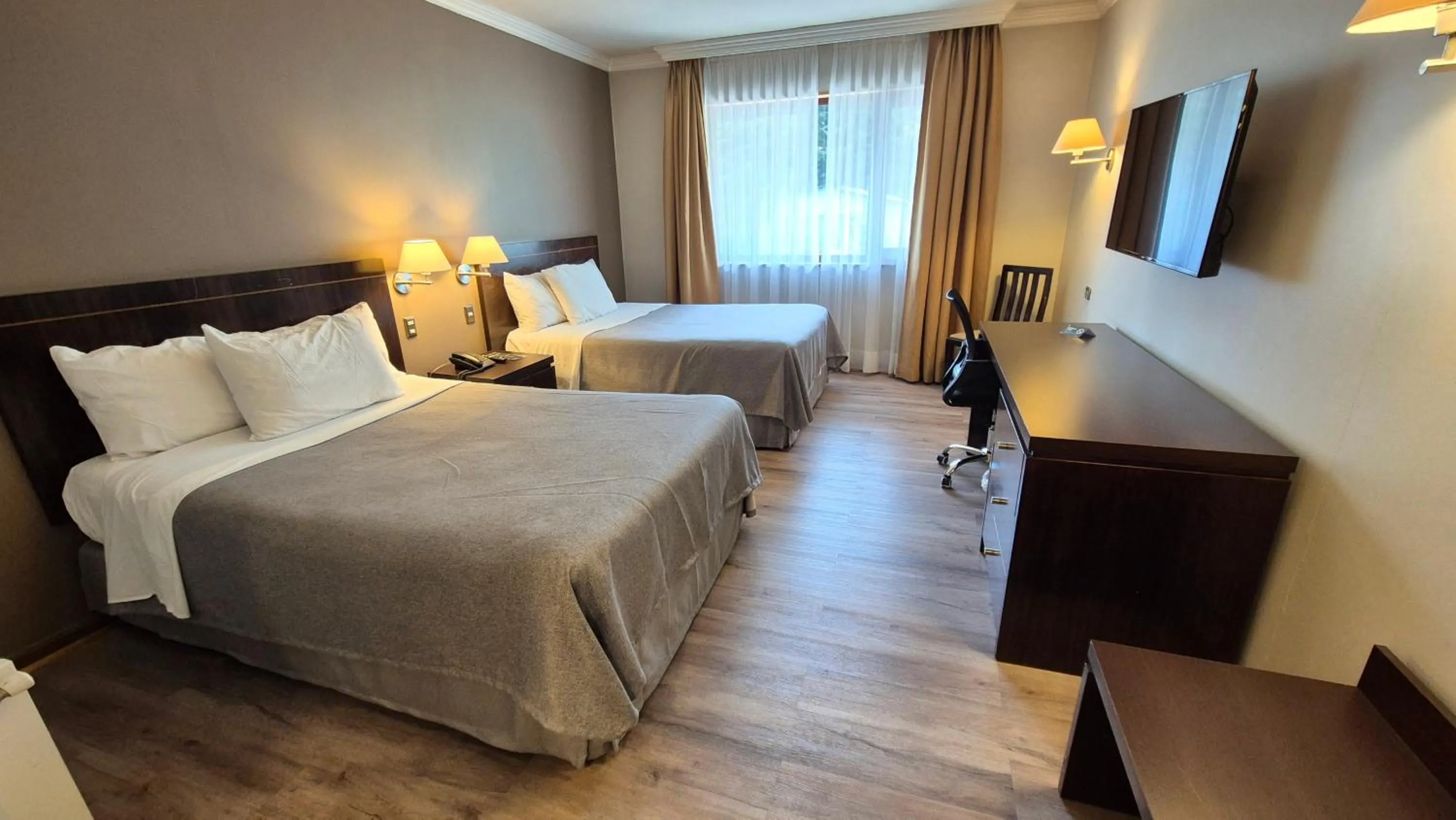 Photo of the whole room, Bed in Hotel Diego de Almagro Coyhaique