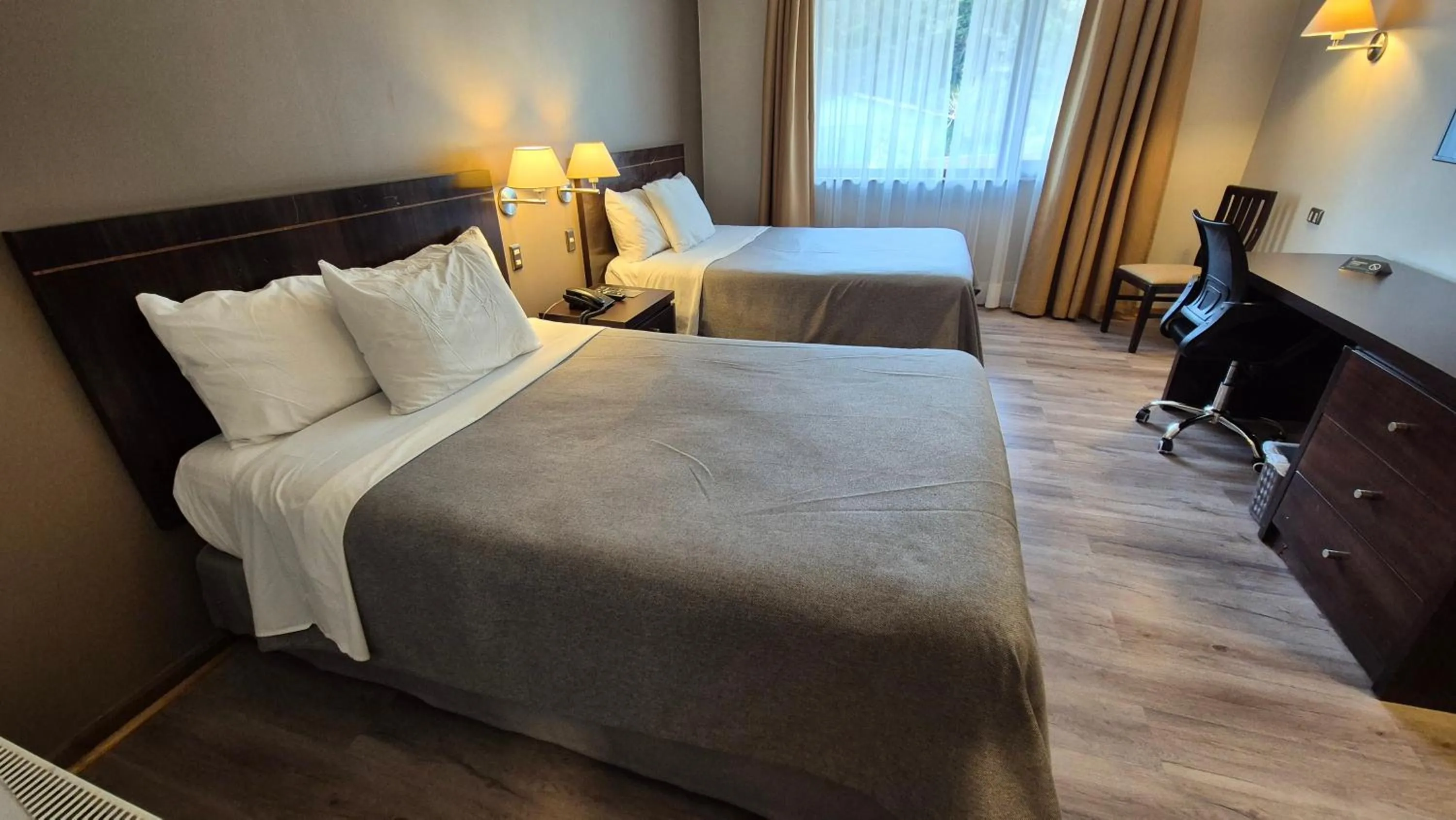 Photo of the whole room, Bed in Hotel Diego de Almagro Coyhaique