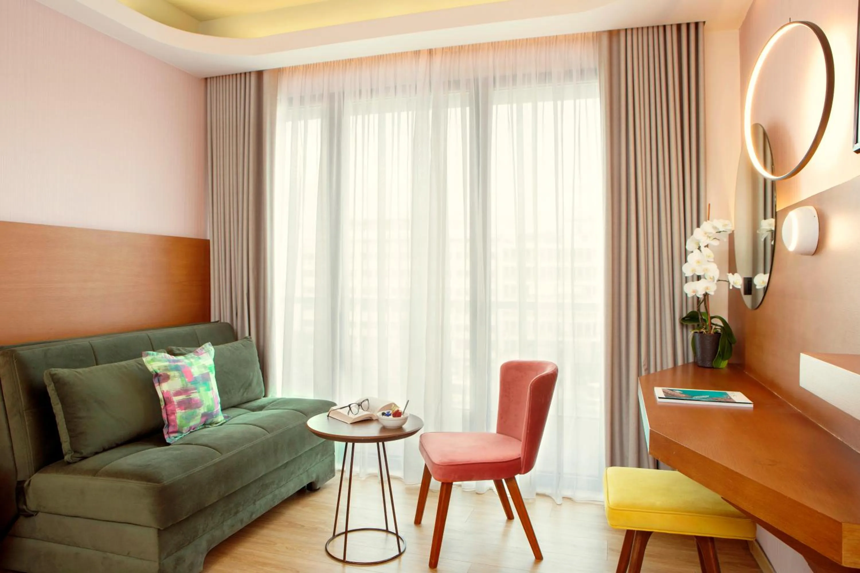 Seating area in Zeus Essence Wyndham Athens Residence