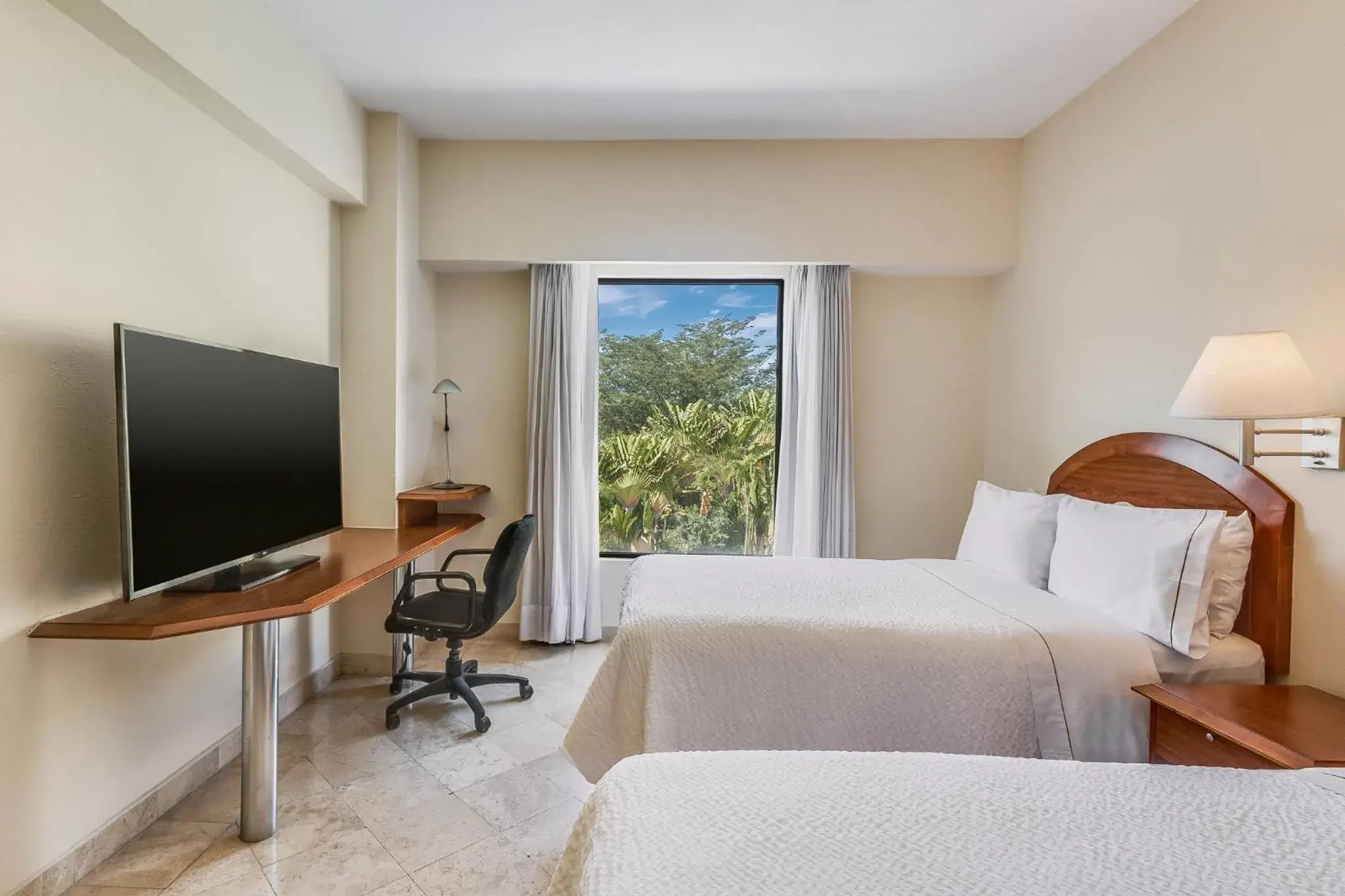 Property building, Bed in Fiesta Inn Colima Property building, Bed in Fiesta Inn Colima