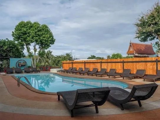 Swimming pool in Pongphen Guesthouse - SHA Plus Certified