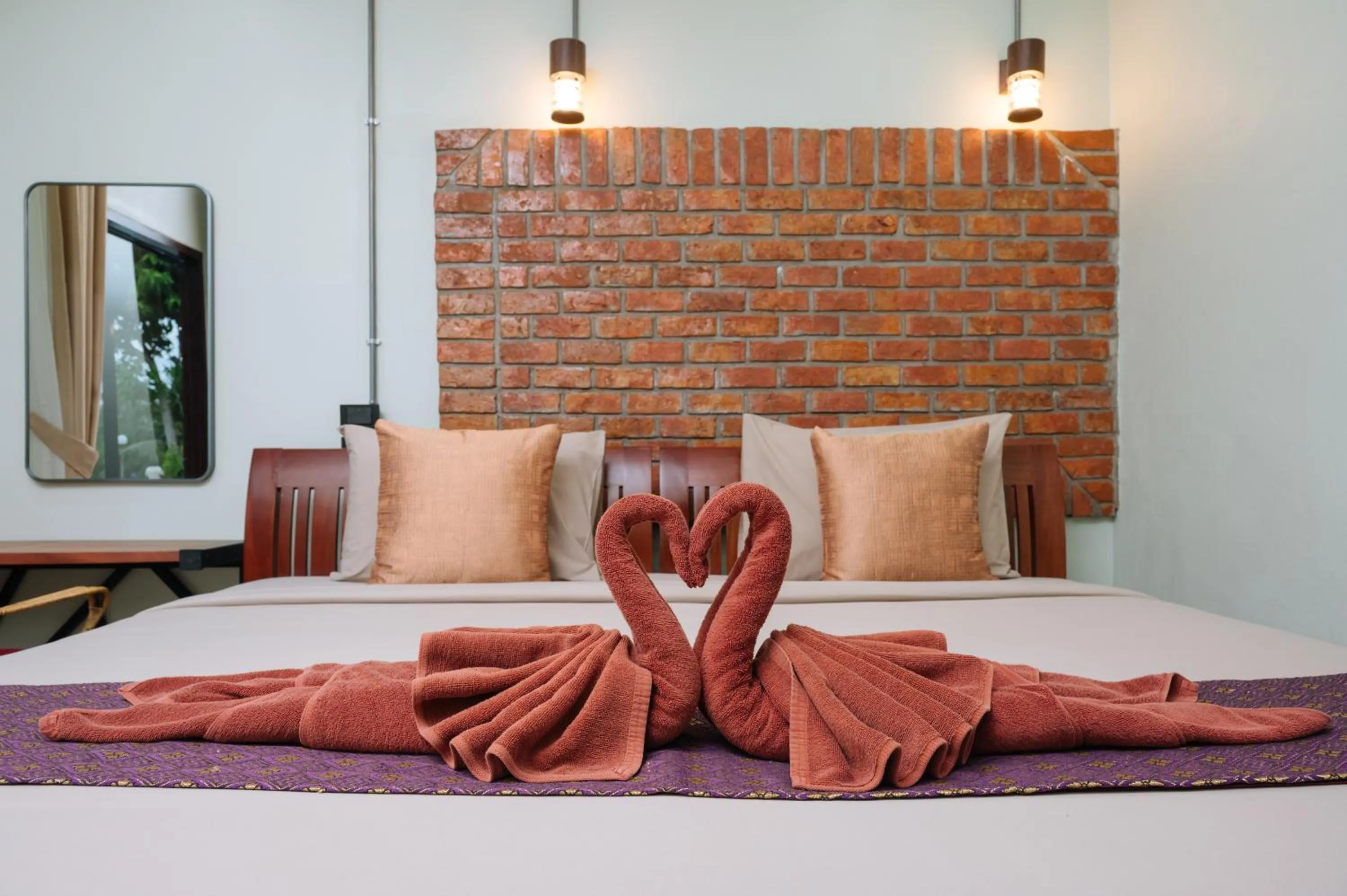 Bed in Pongphen Guesthouse - SHA Plus Certified