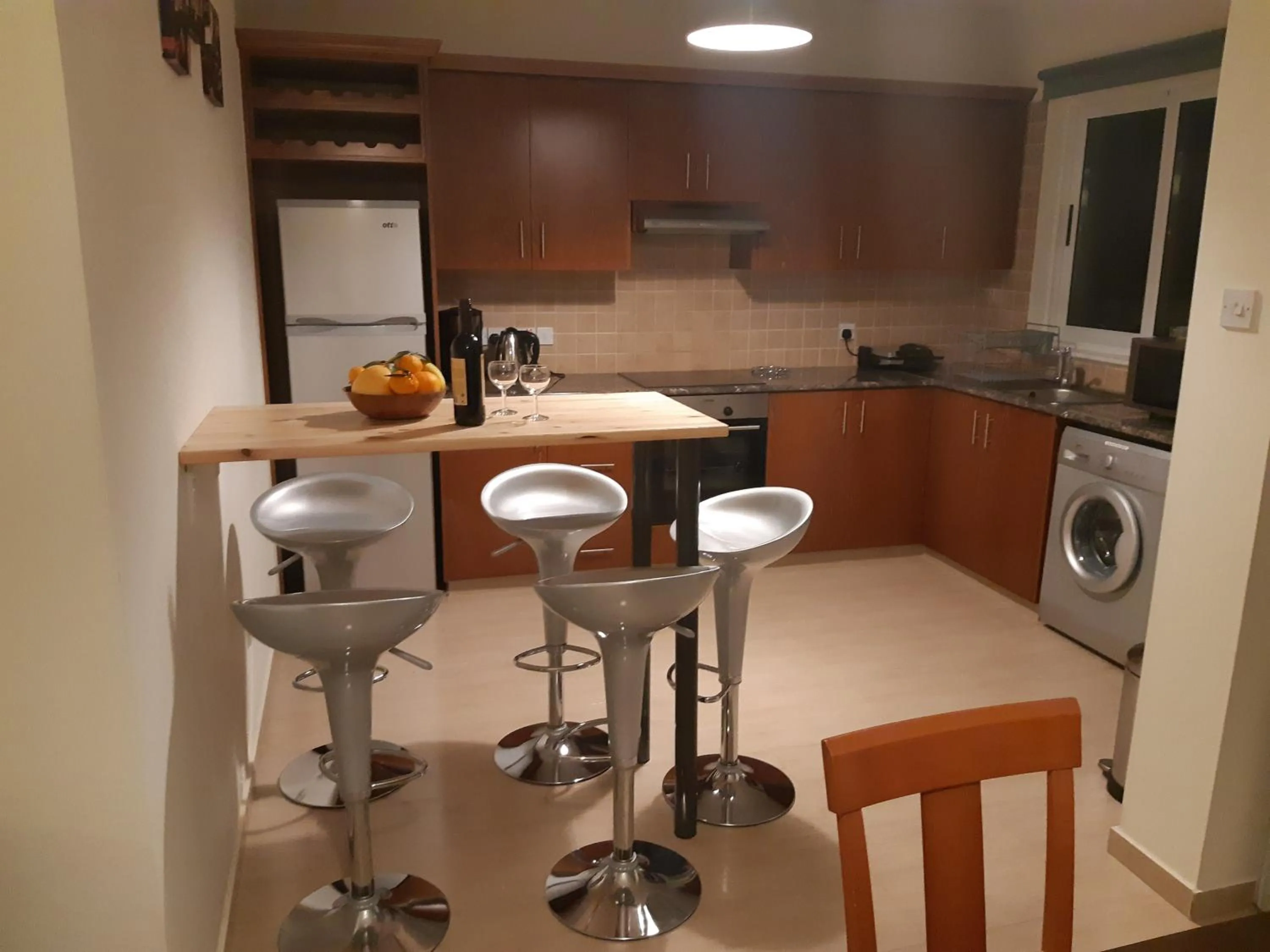 Kitchen or kitchenette in Vasilas Holiday Apartment #1