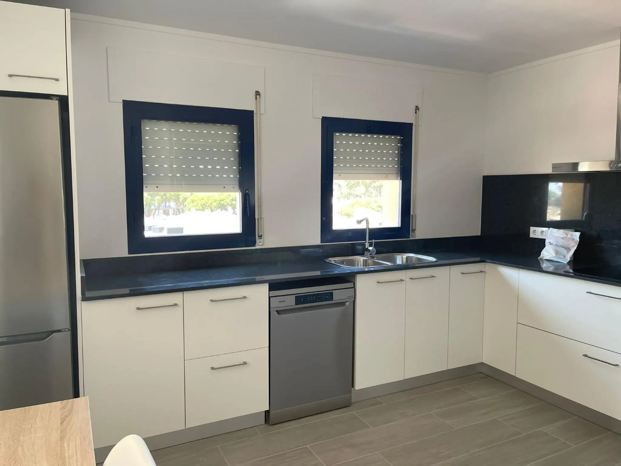 Kitchen or kitchenette in Apartamentos Marblau