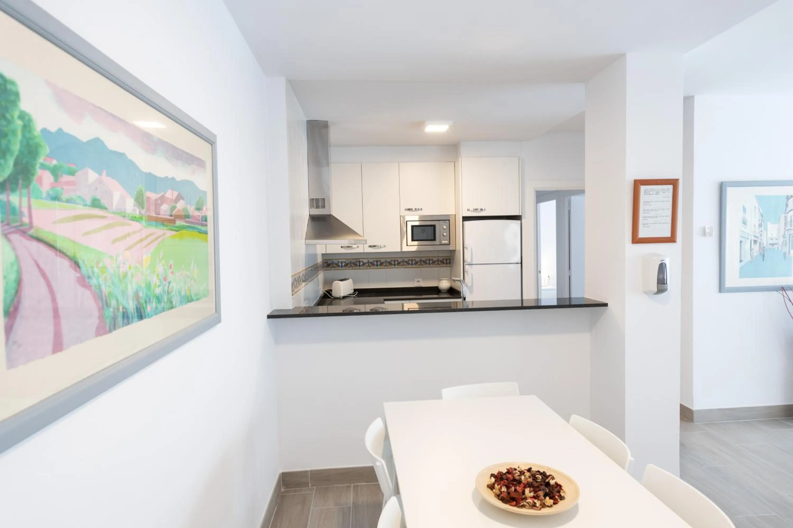 Kitchen or kitchenette in Apartamentos Marblau