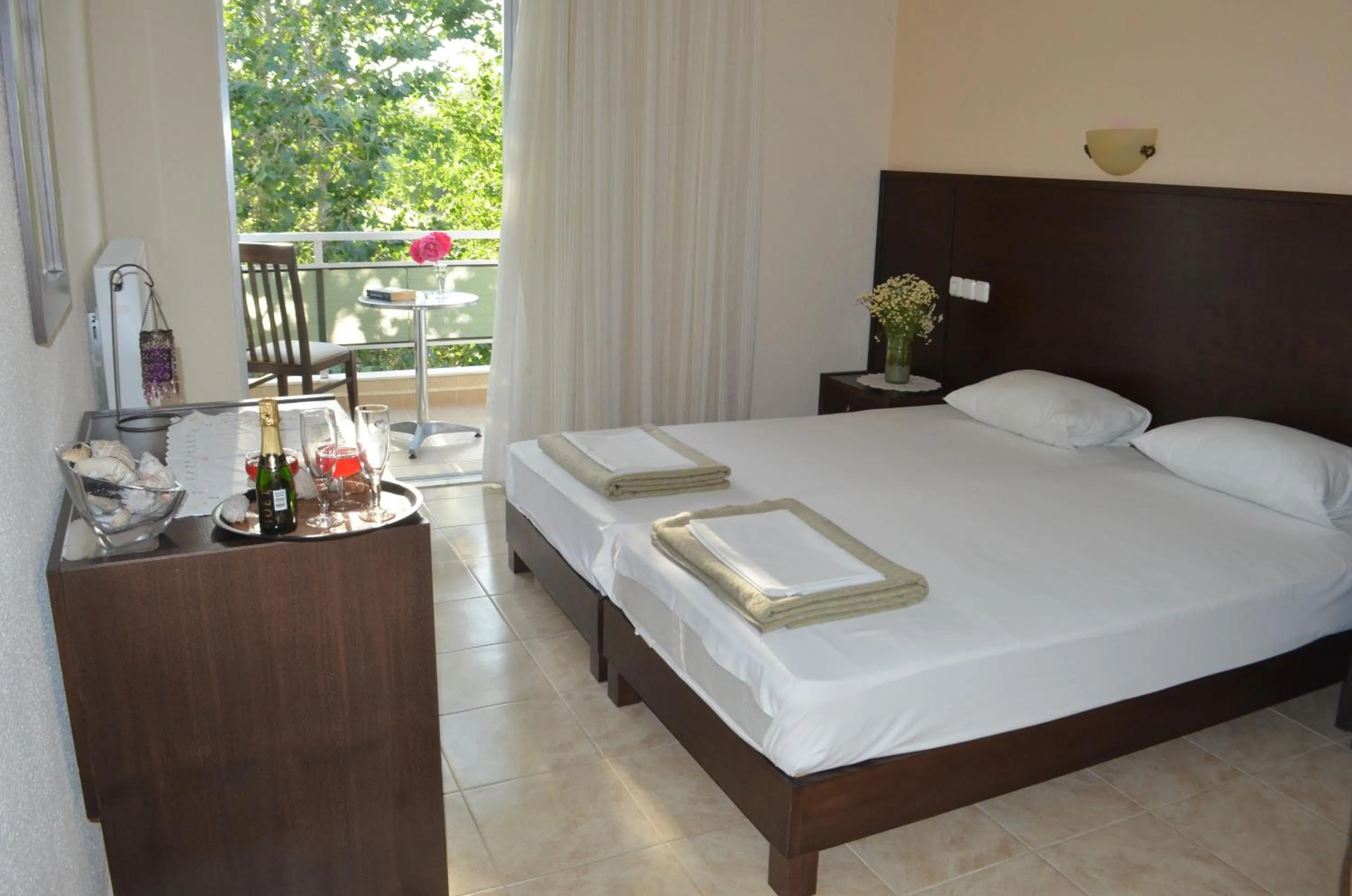 Bed in Hotel Achillion