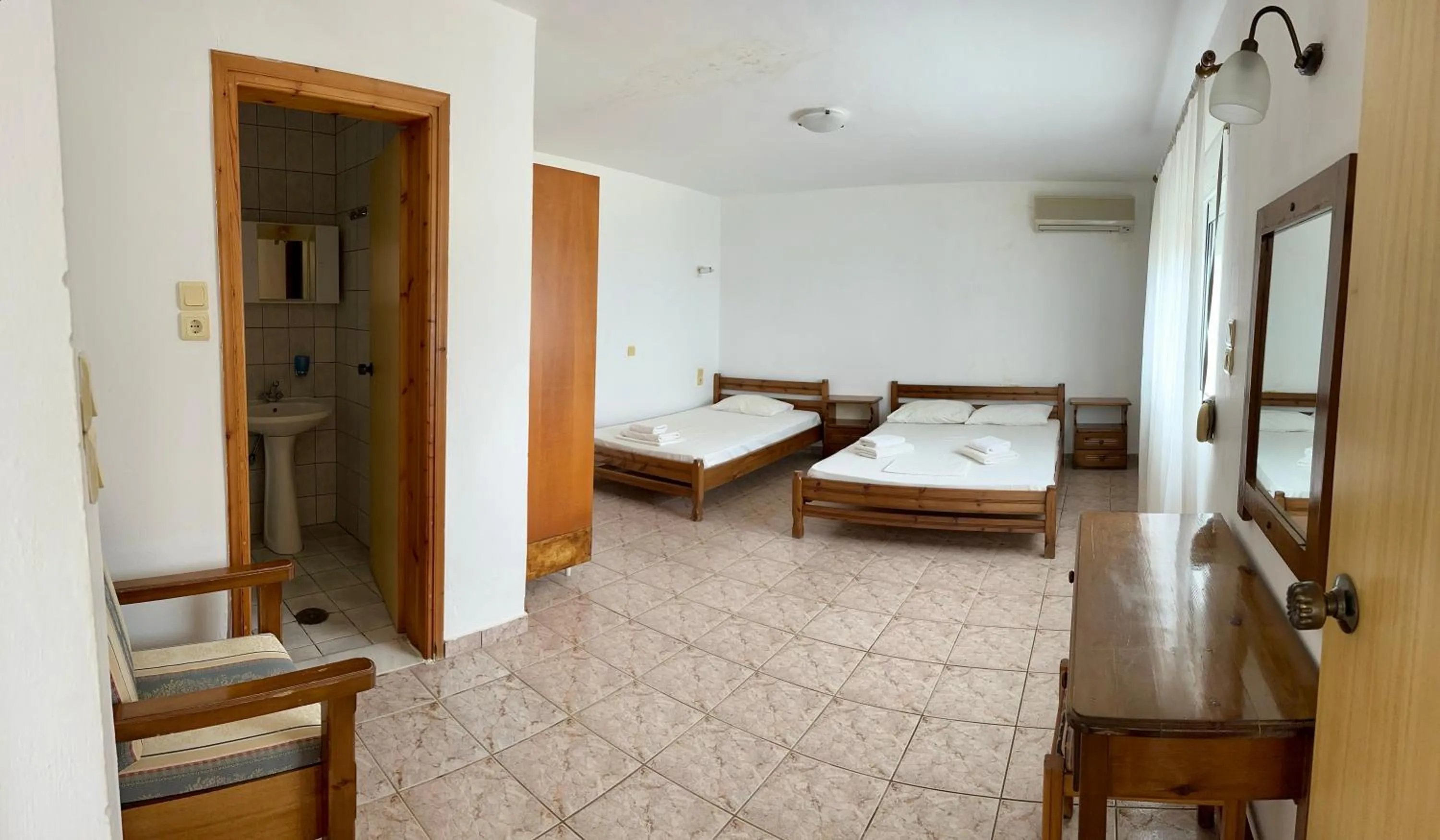 Bed in Sfinias Apartments