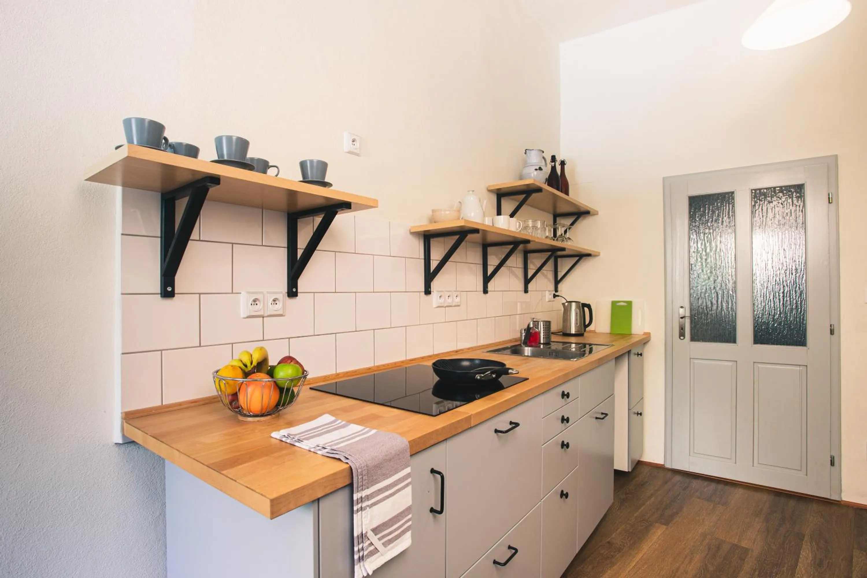 Kitchen or kitchenette in Downtown Apartments