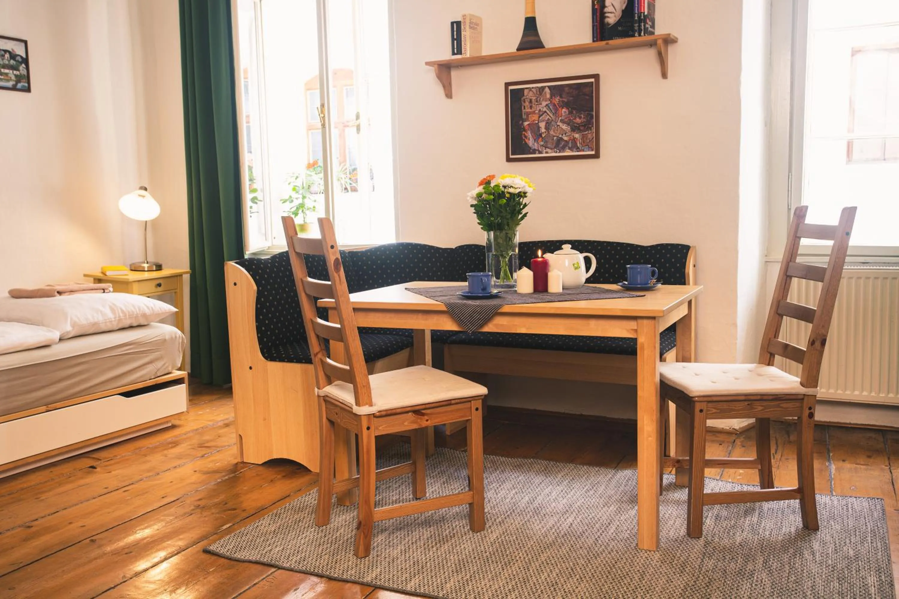 Seating area, Bed in Downtown Apartments