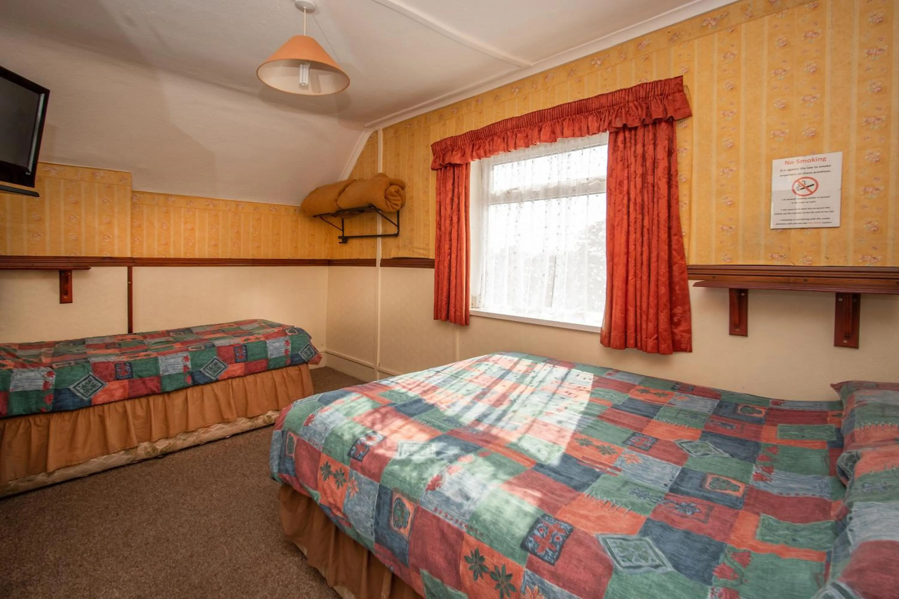 Bed in The Rollason Hotel