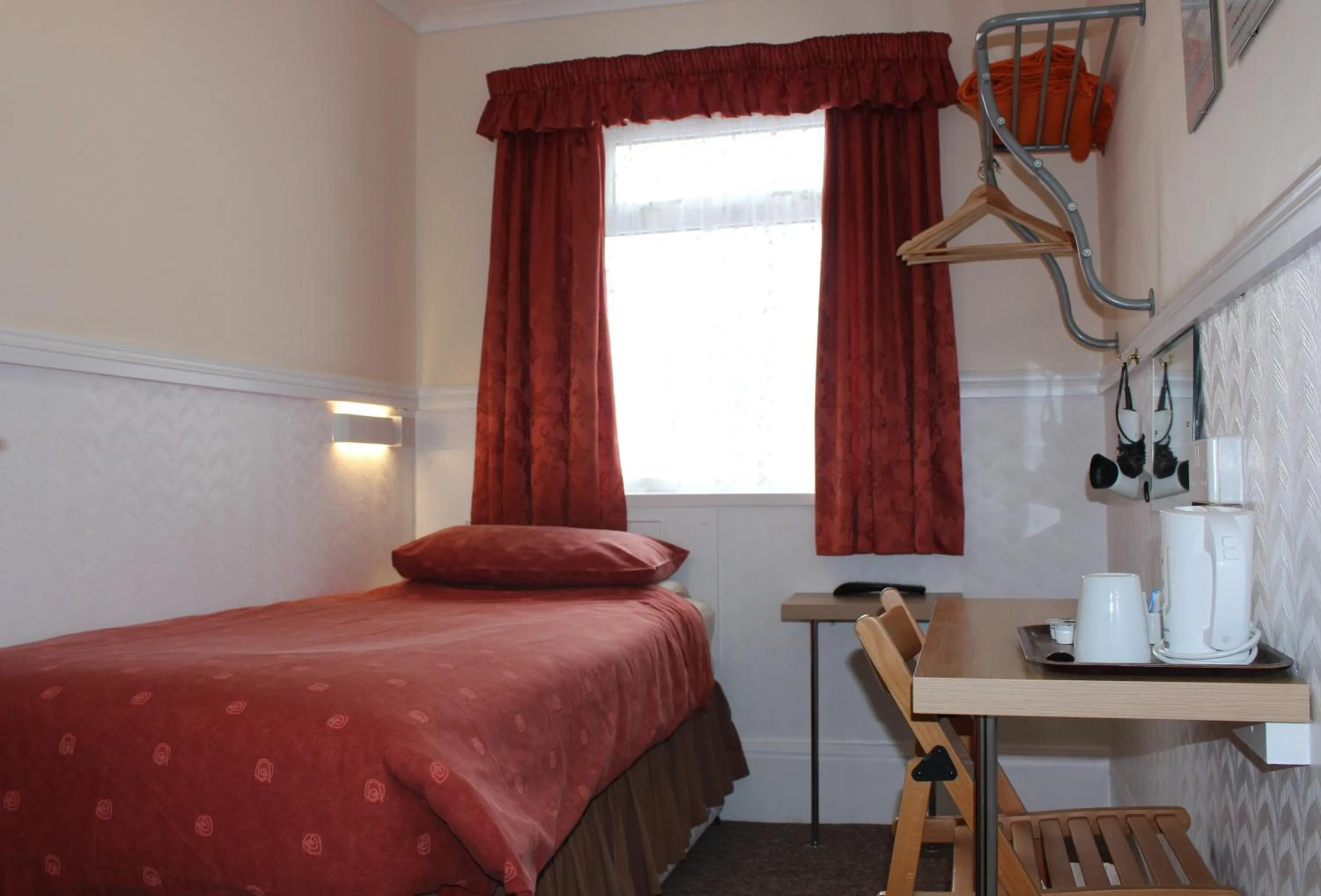 Bed in The Rollason Hotel