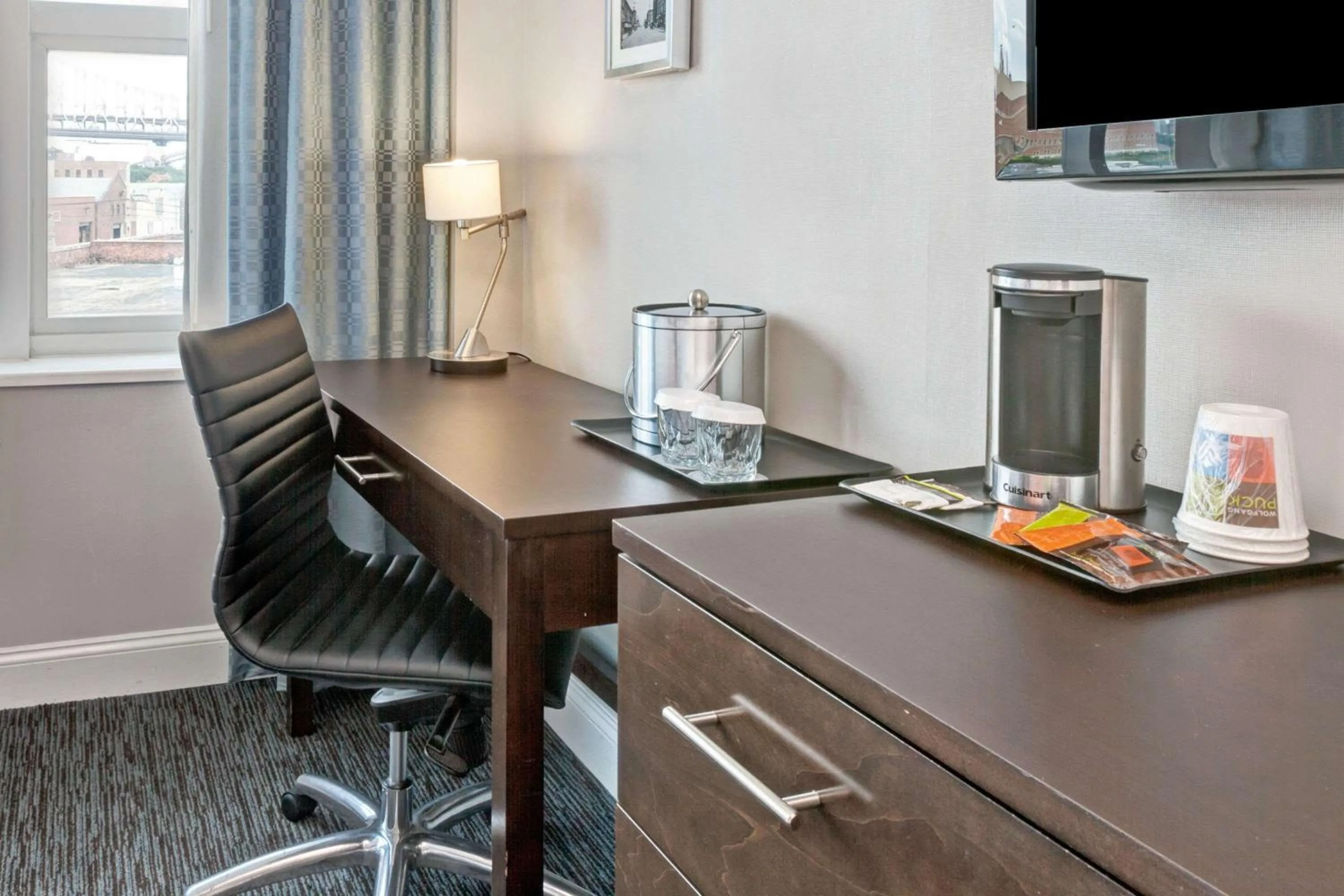 Photo of the whole room, TV/Entertainment Center in Wyndham Garden Long Island City