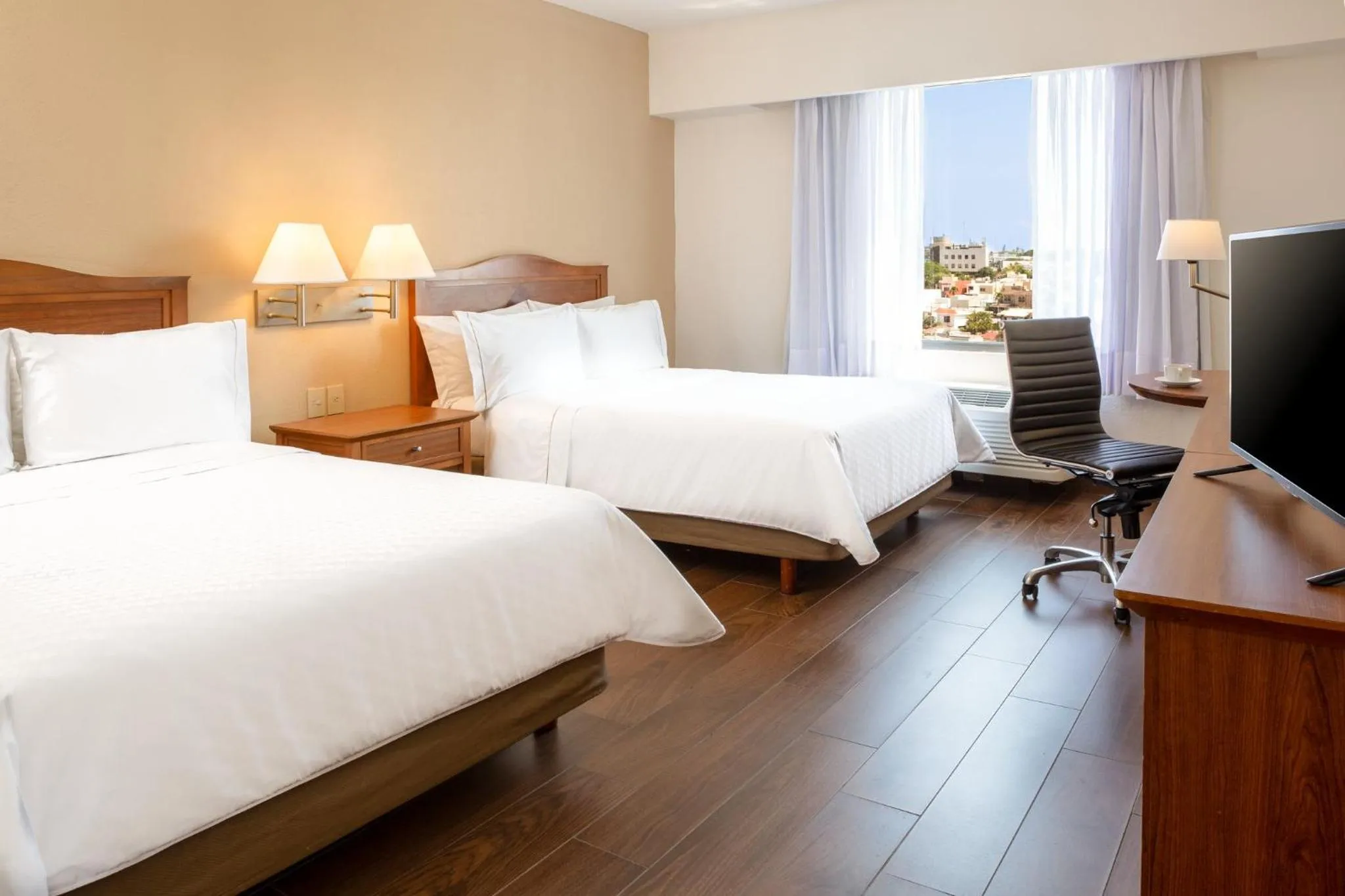 Photo of the whole room, Bed in Fiesta Inn Tampico