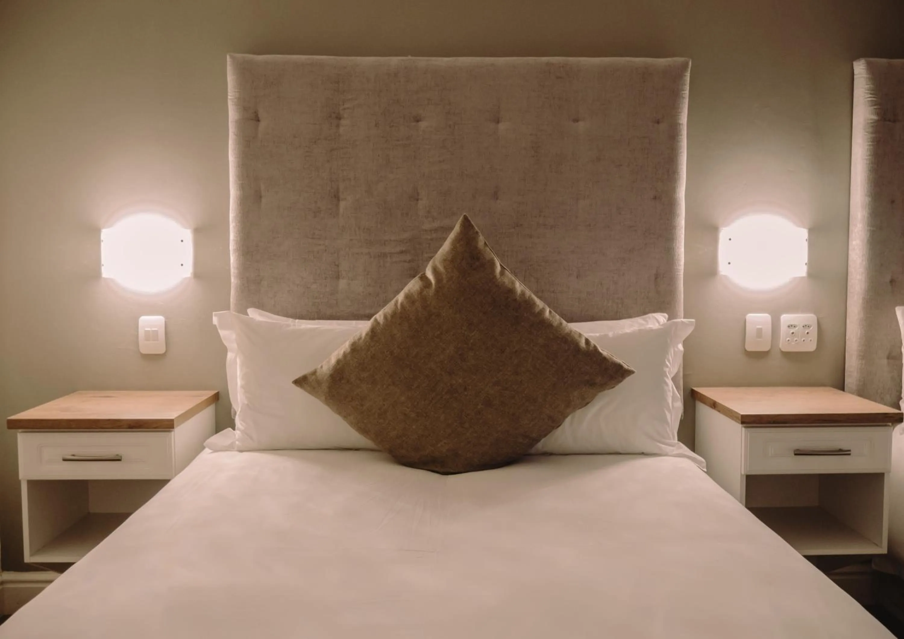 Bed in HERMS Restaurant & Boutique Hotel