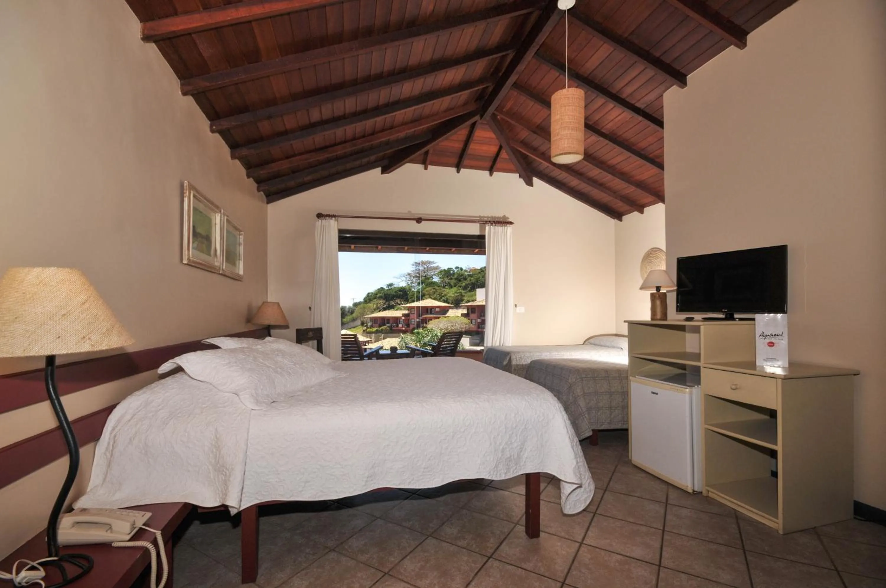 Bed in Aguabúzios Hotel