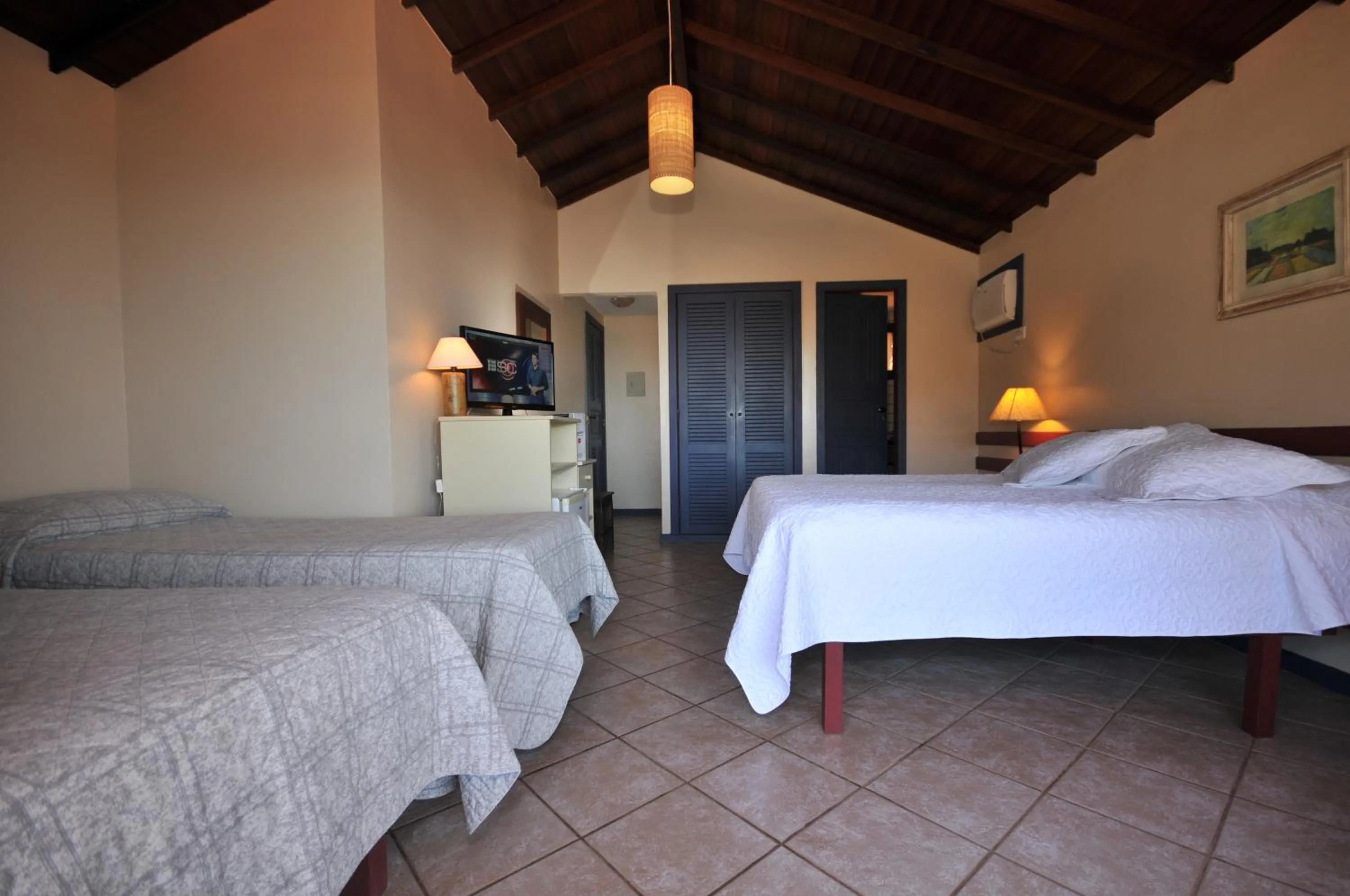 Bed in Aguabúzios Hotel